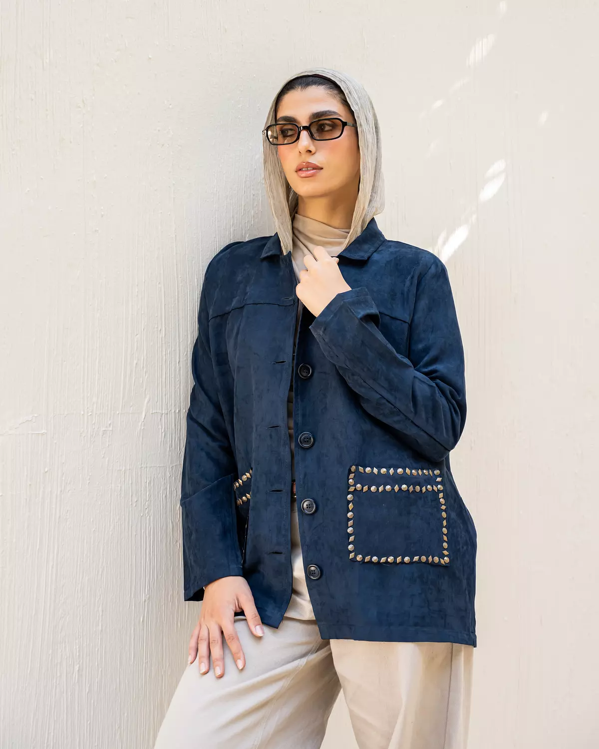 <p style="text-align: center">Studded Jacket In Navy</p>