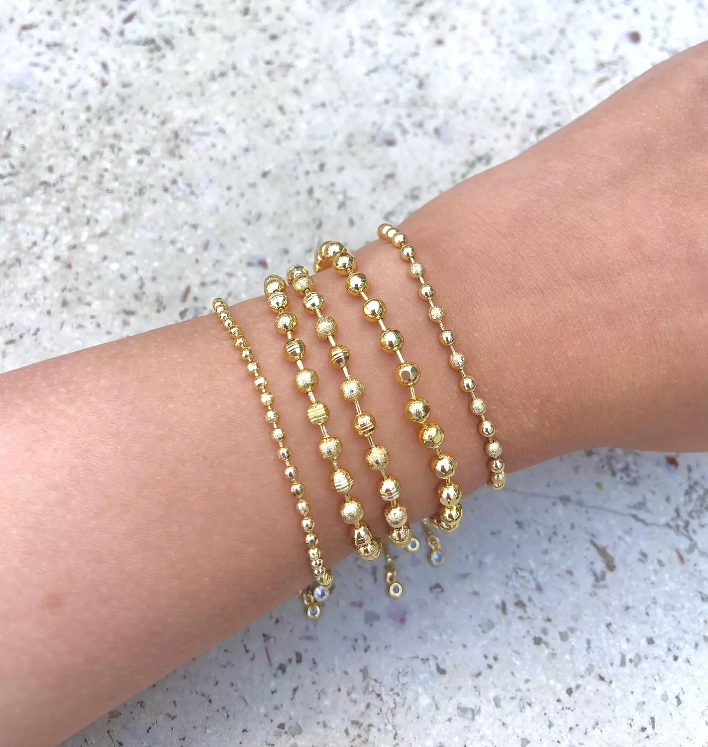 Gold circle bracelets image
