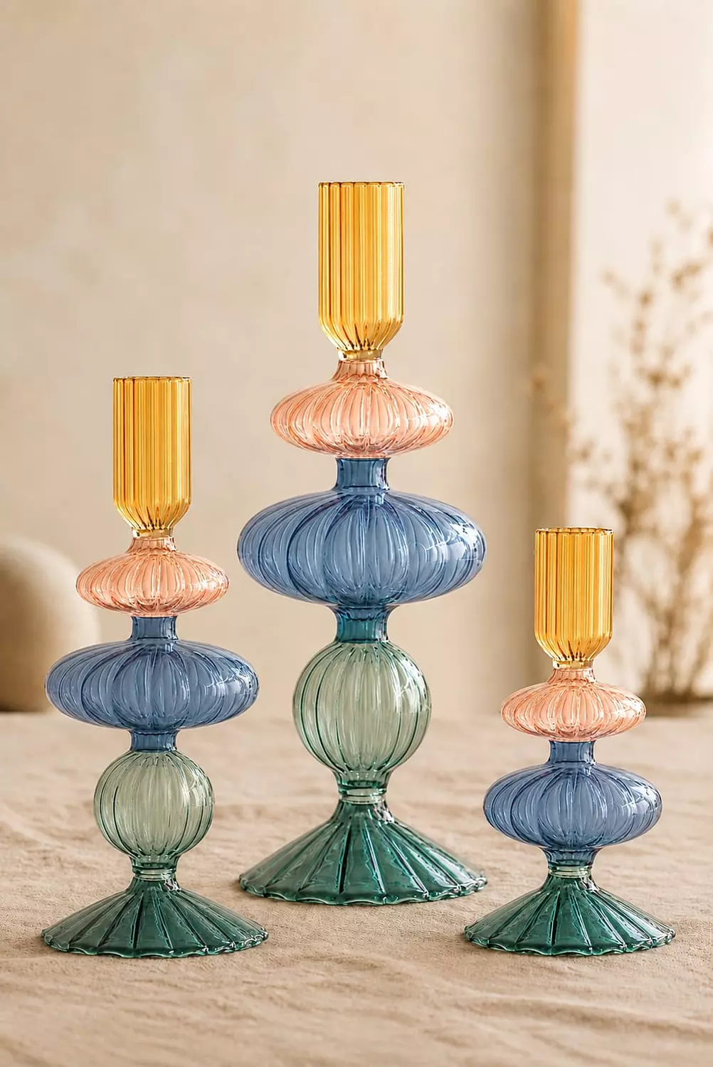 A Set of three candle holders image