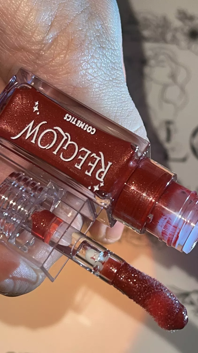 Burgundy lip gloss image