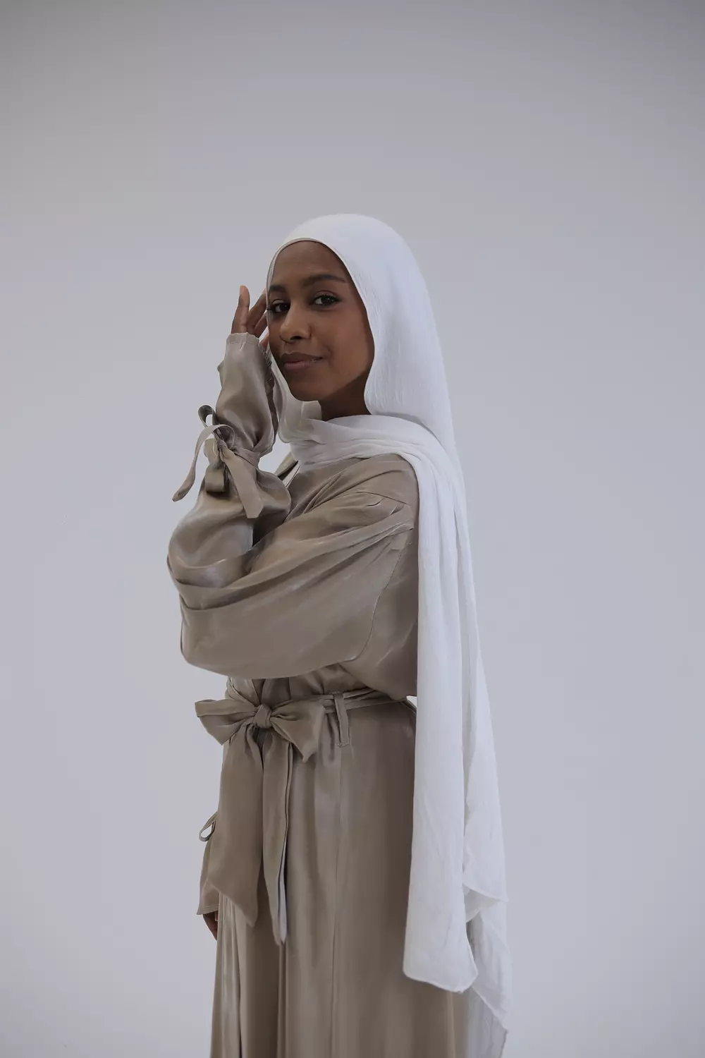 Beige cardigan stan with a waistband 3