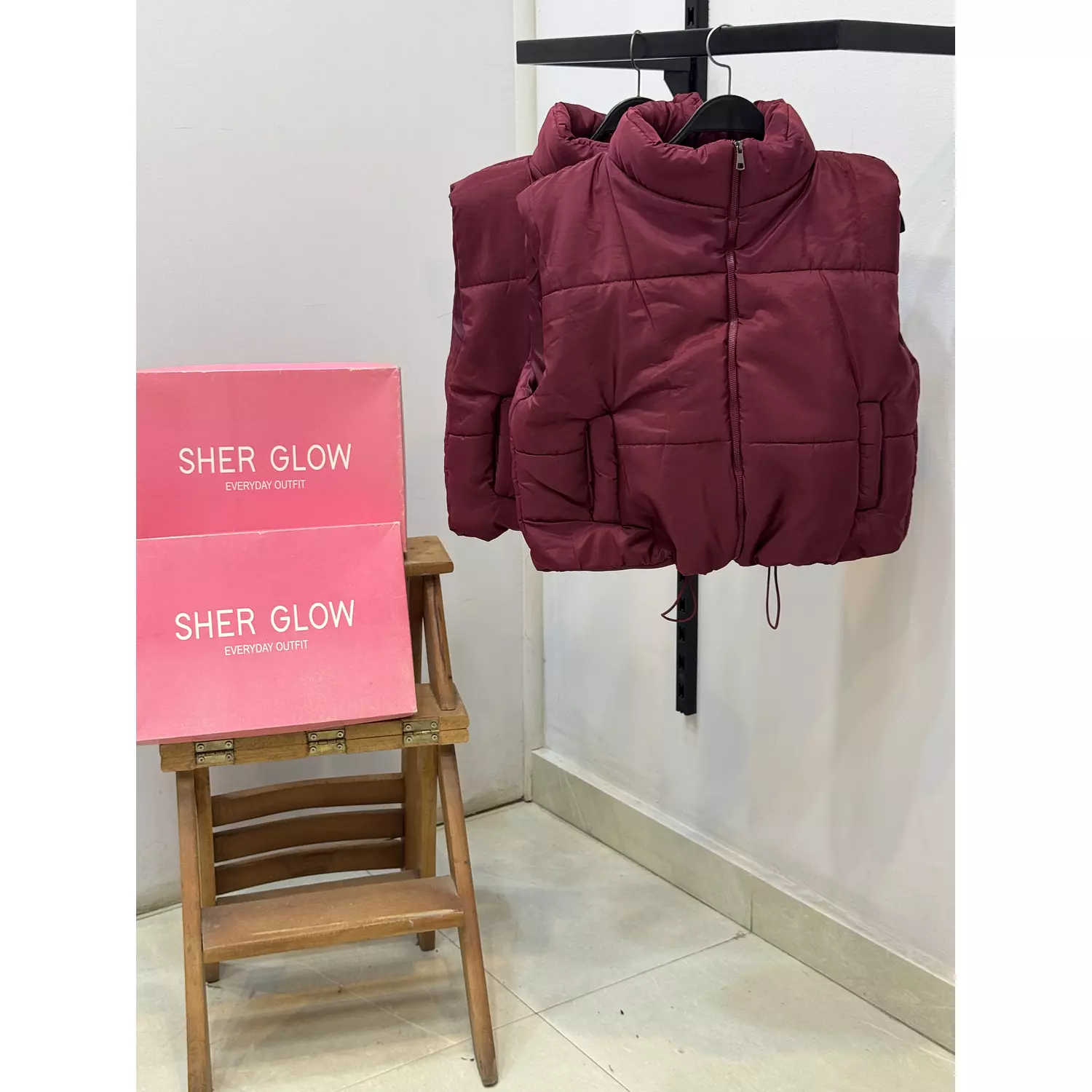 Burgandy puffer vest hover image