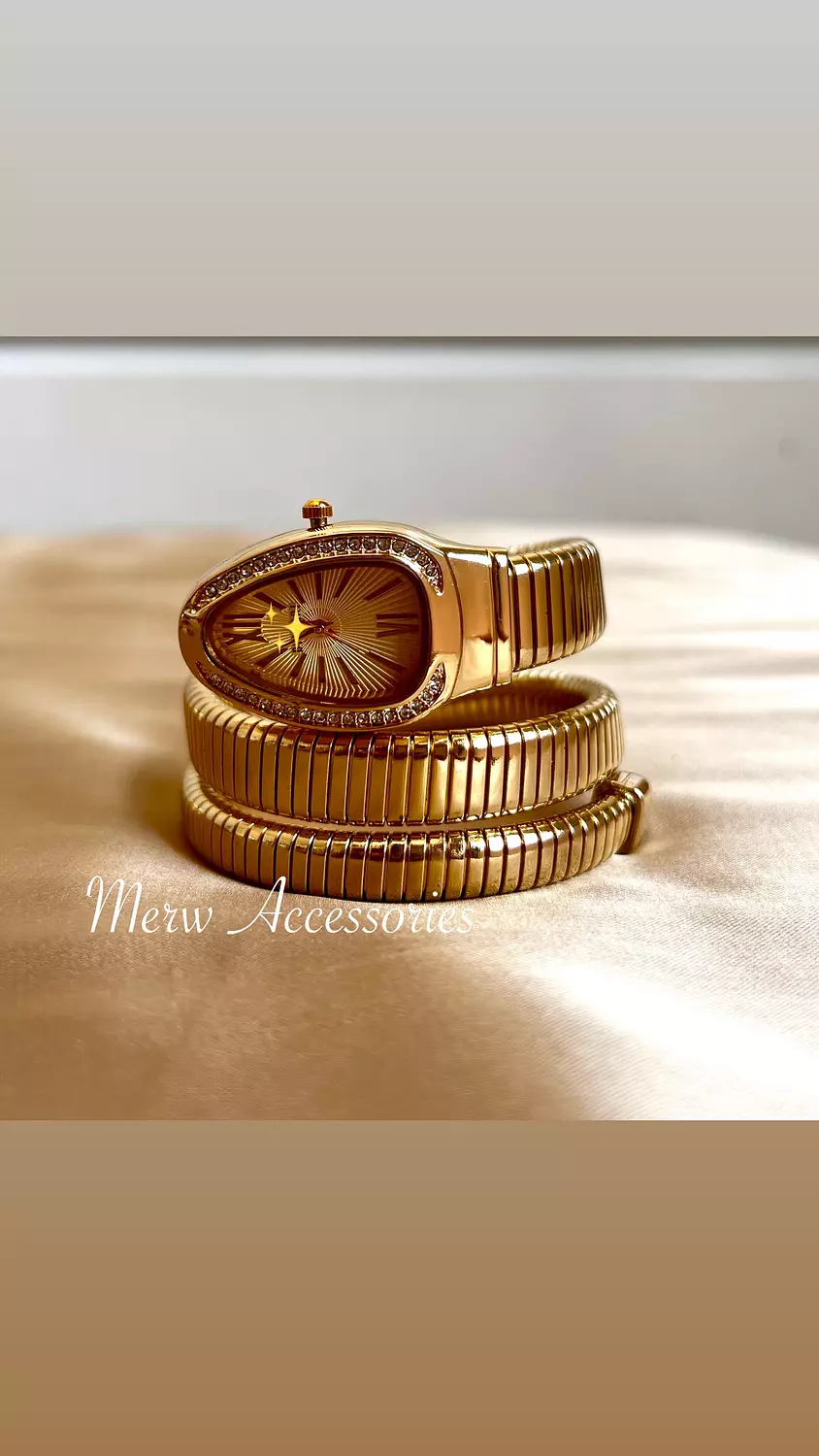 Gold snake watch  image