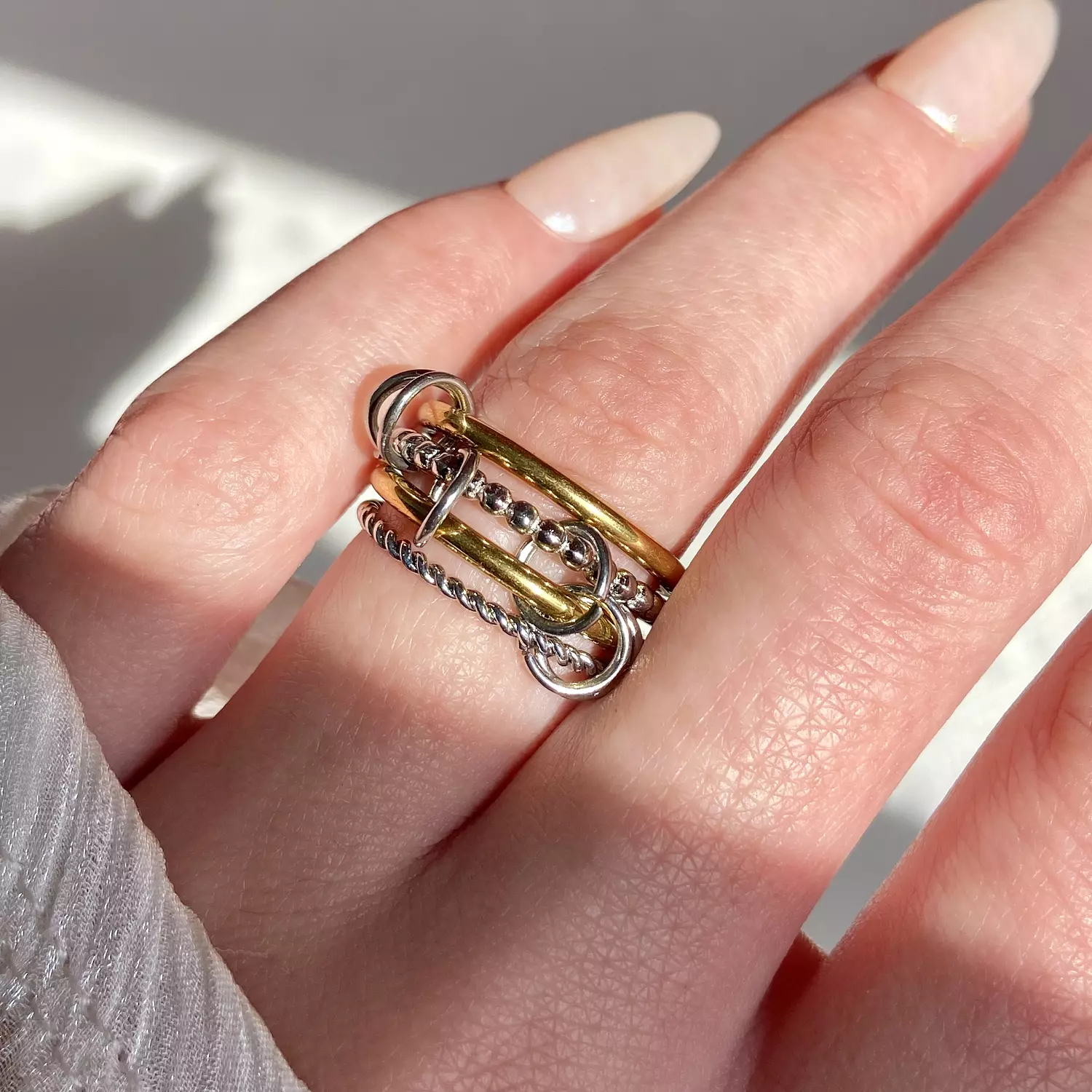 4 rings in one gold and silver  image