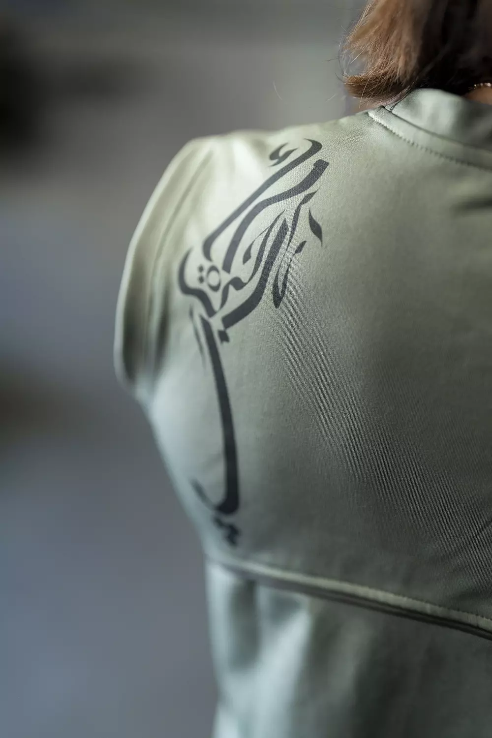 HURRA'S OLIVE SPORTY TOP - حره كالسحاب 1