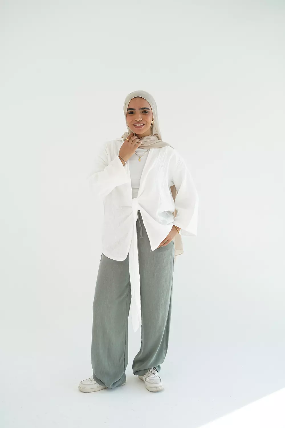White open cotton blouse with front tie hover image