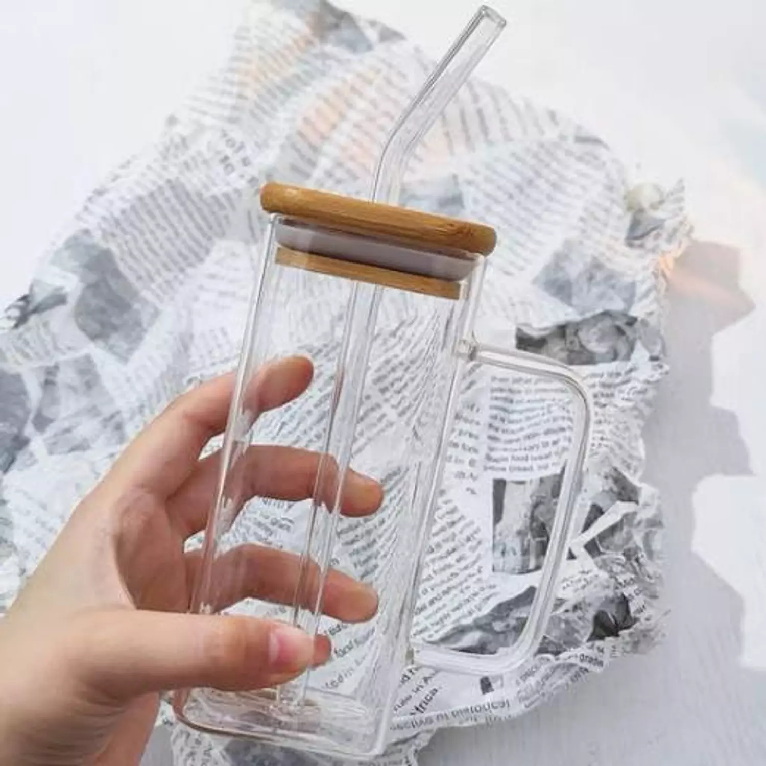 Square glass mug with straw image