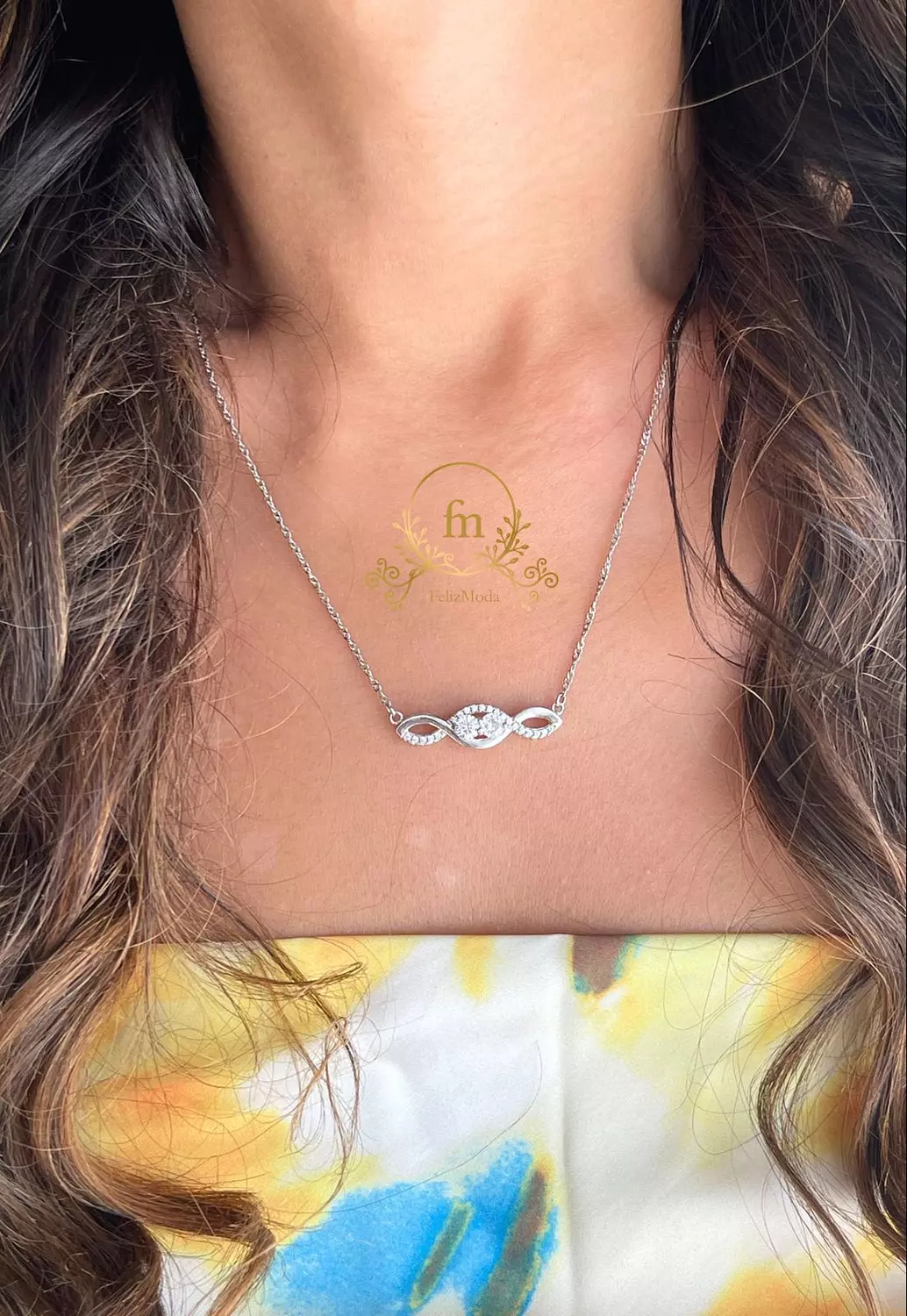Ribbon silver necklace with two round stones image