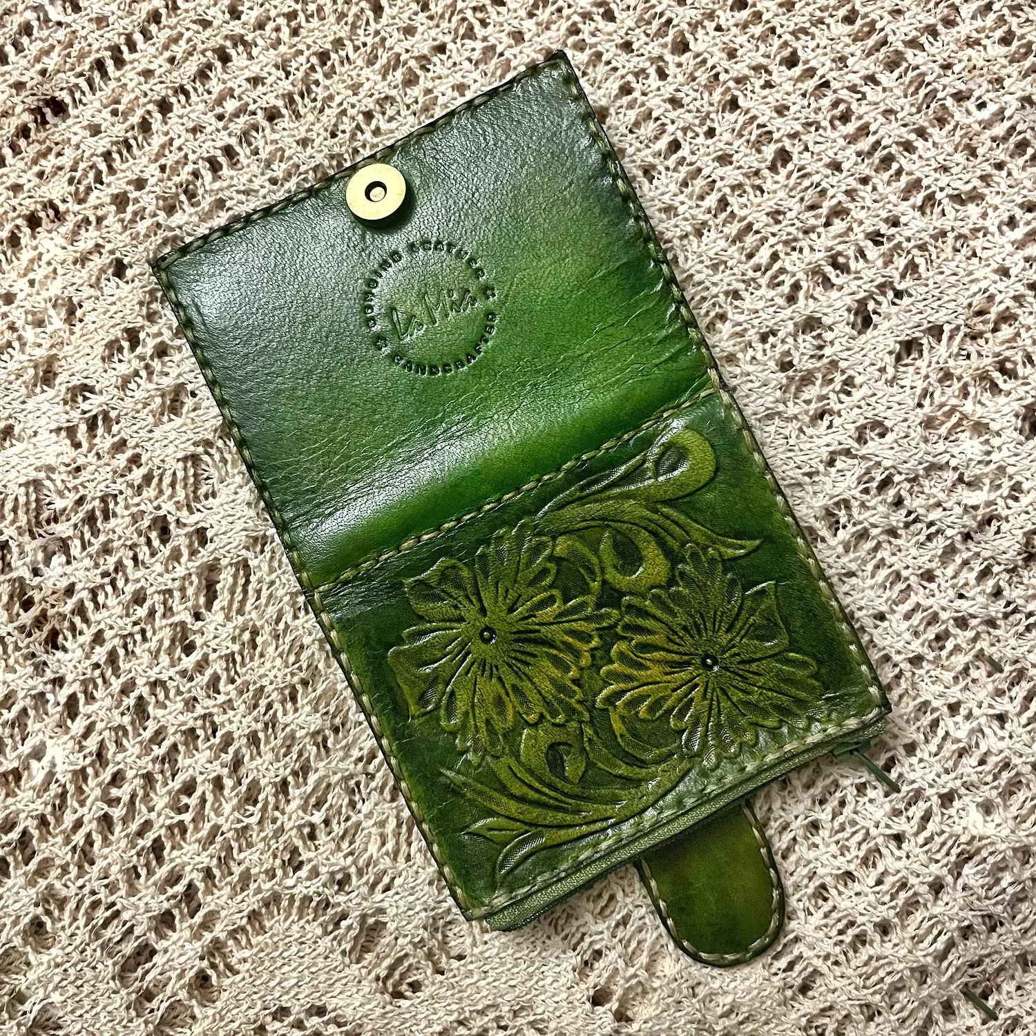 Tooled floral small leather wallet hover image