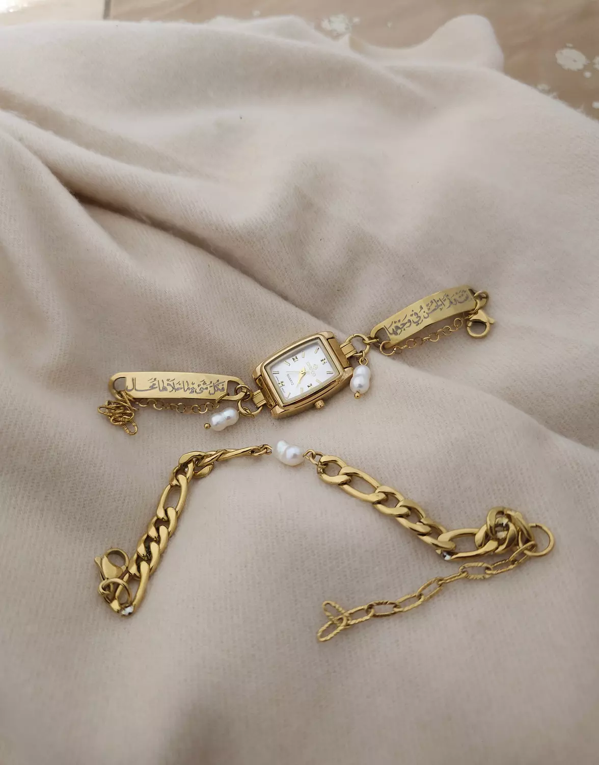 تمت وتم الحُسن في وجهِها/ساعة  image