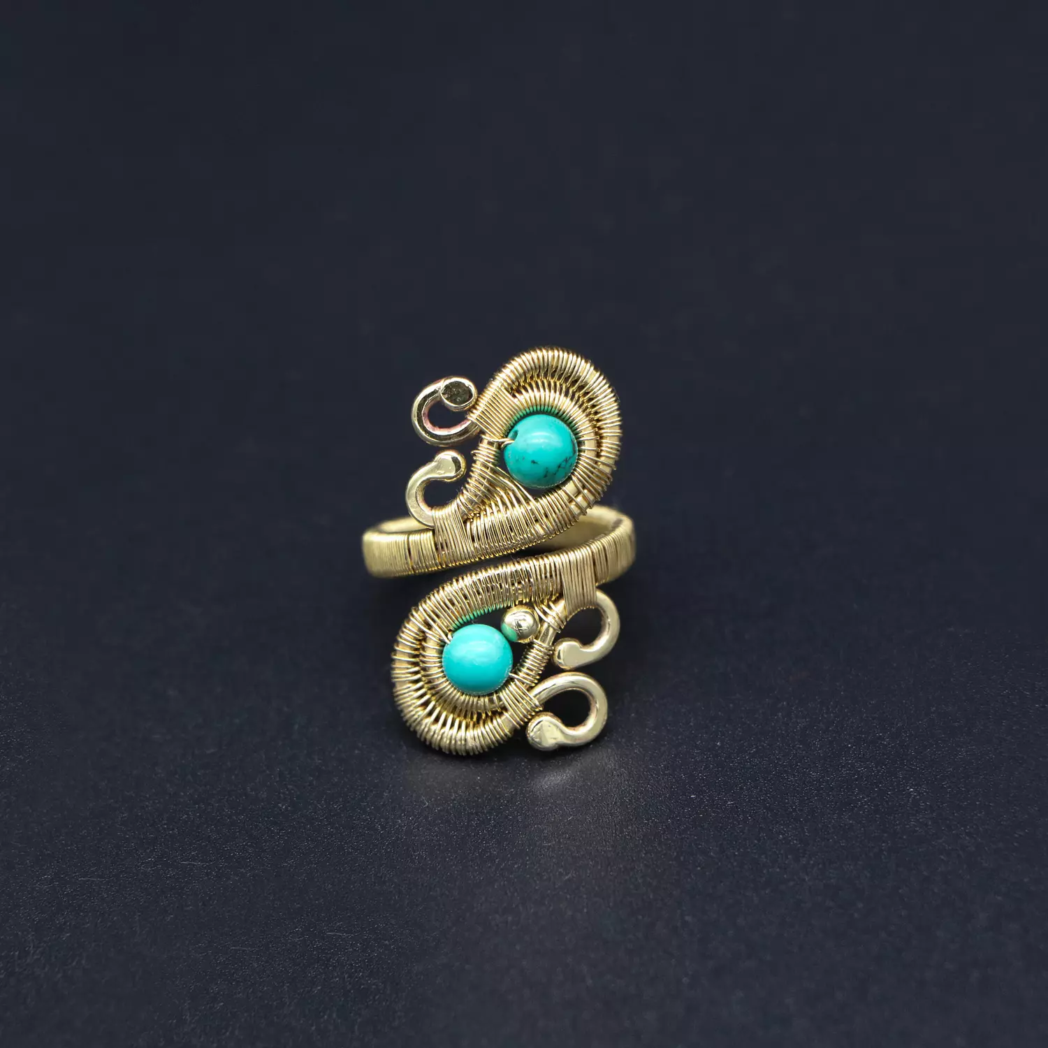 Handmade brass ring with turquoise howlite stones. image