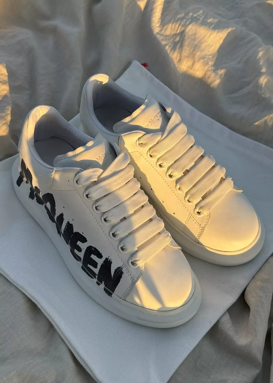 Alexander McQueen graffiti-logo print leather White image