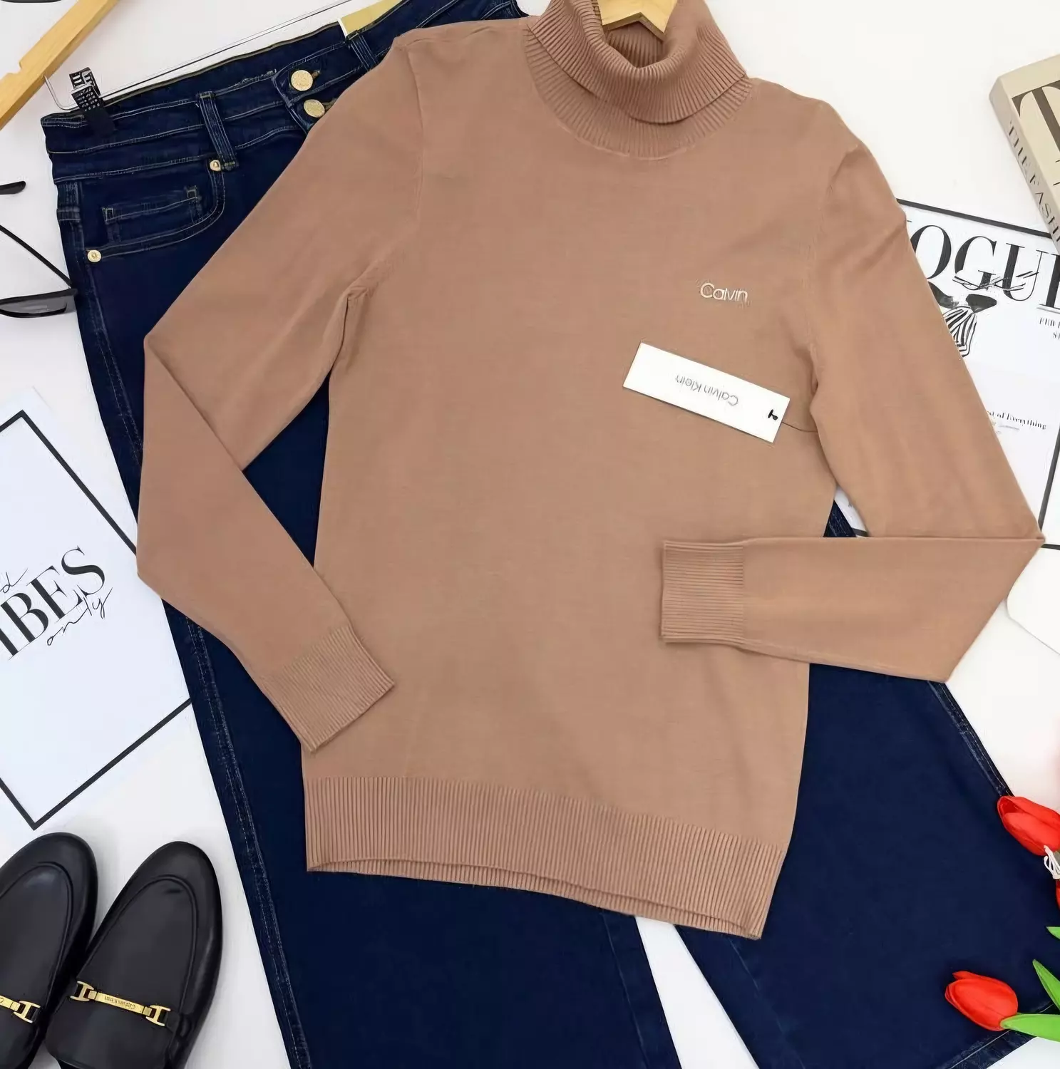 A soft neutral shade  beige  Calvin Klein  hover image