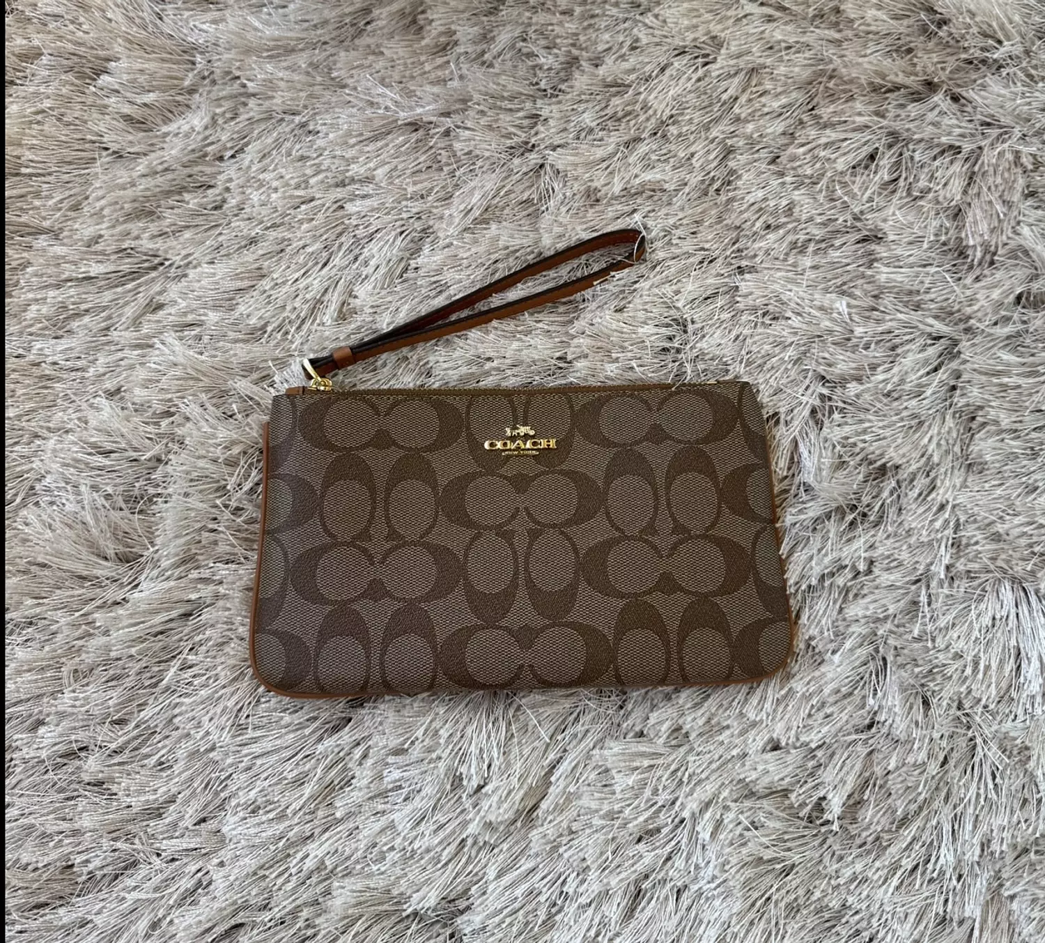Coach wristlet in signature canvas in tan brown 1