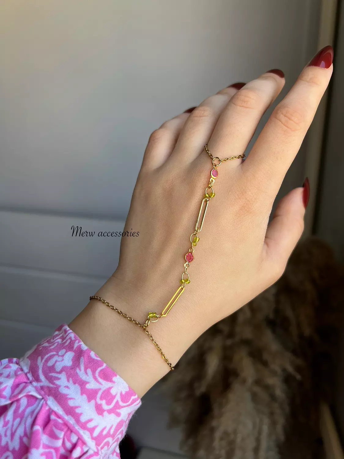 Pink green hand chain  image