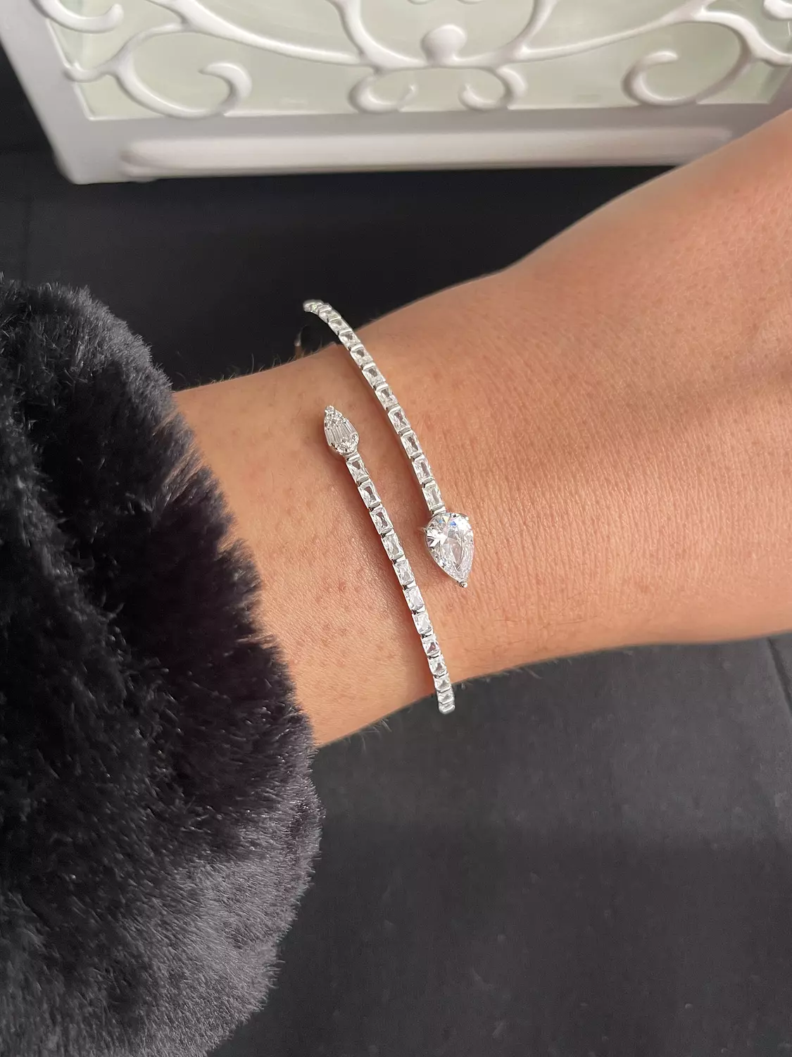 Two oval and multiple crystals silver bangle image