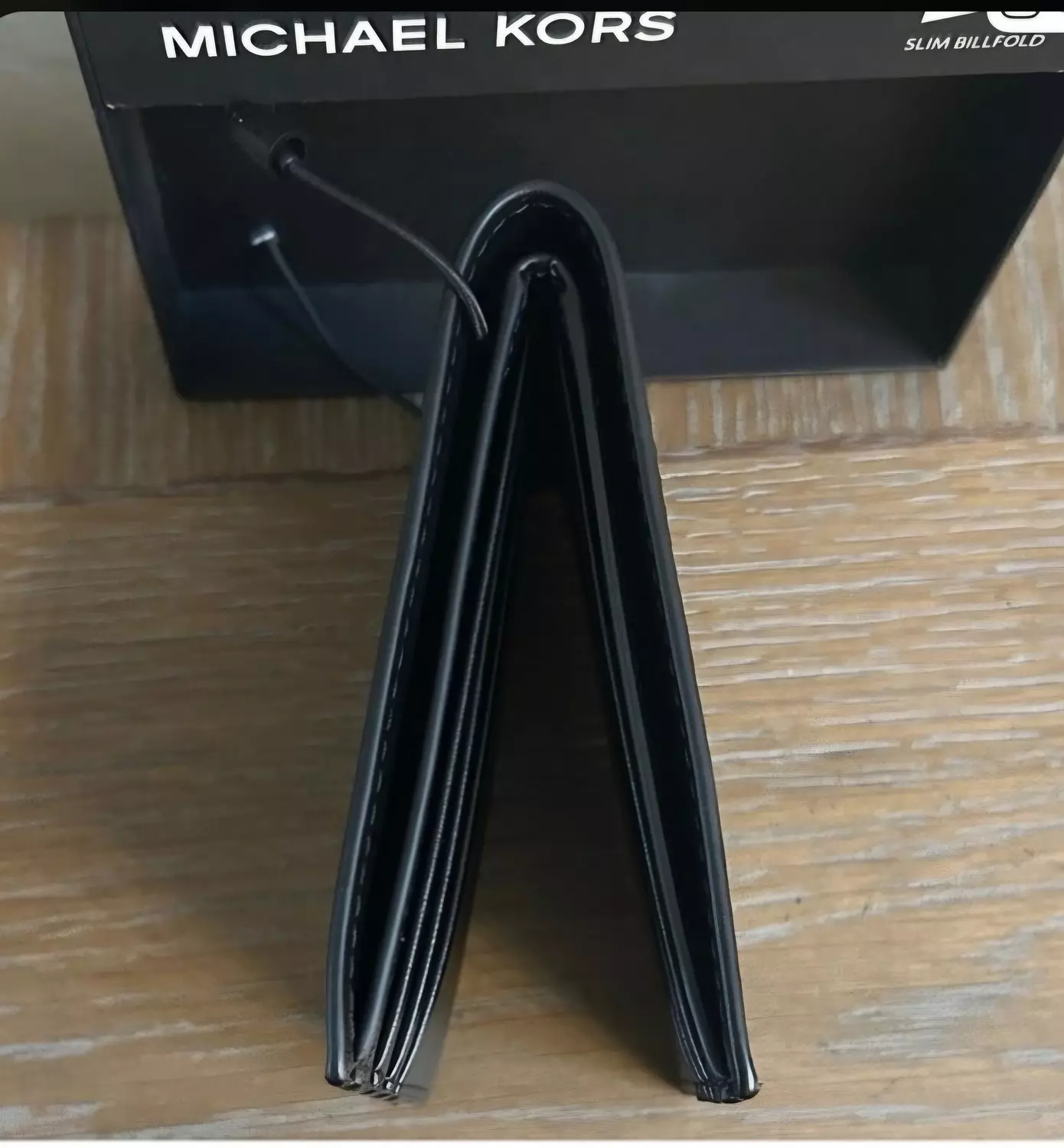 Michael kors slim Billfold wallet man hover image
