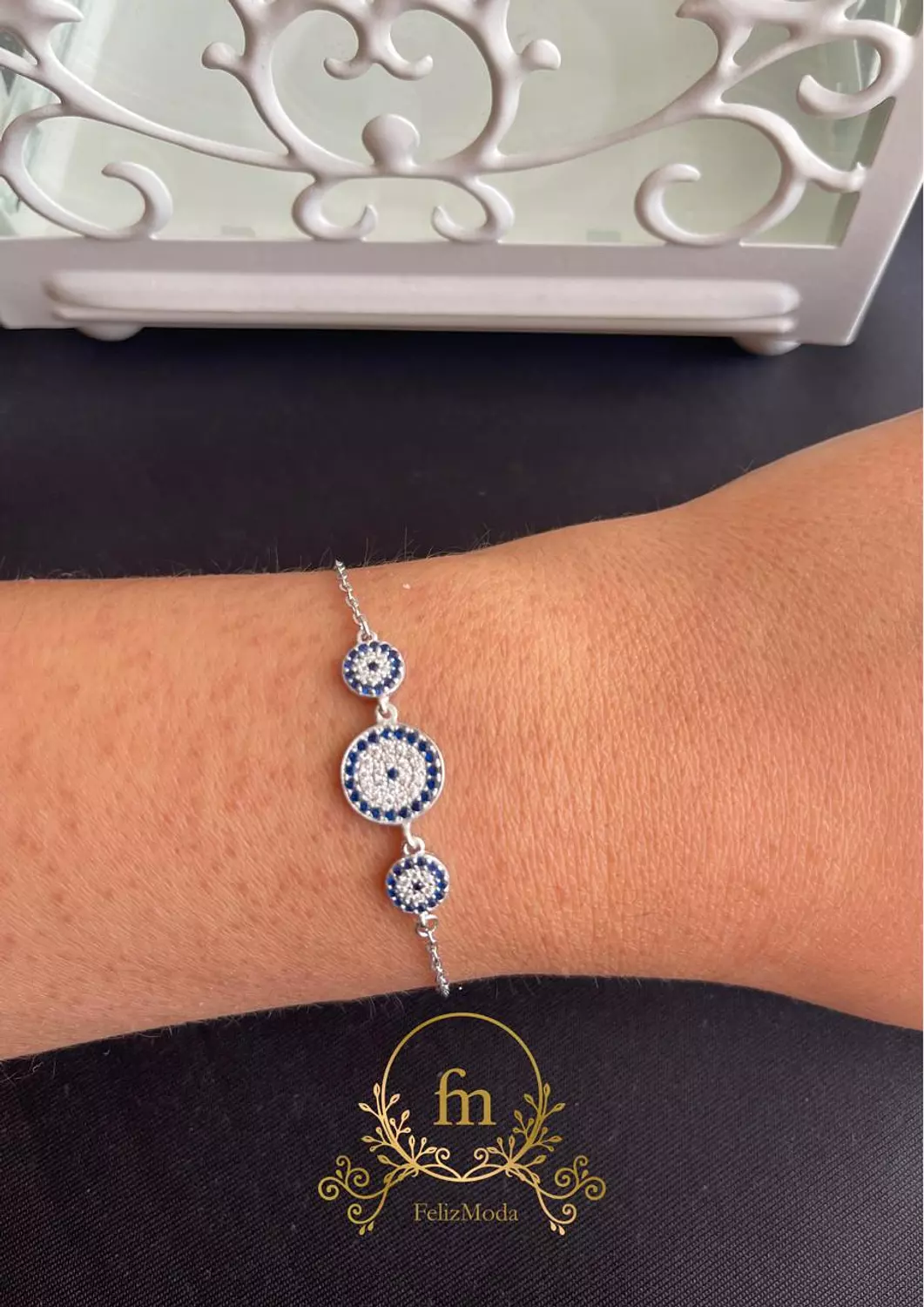Three blue eyes silver bracelet with zircon stones image