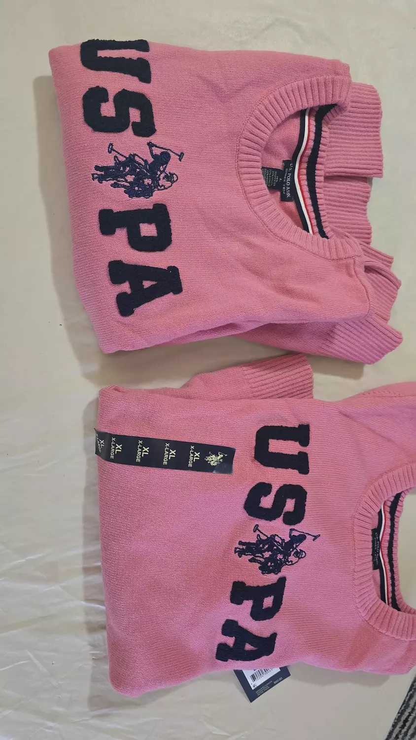  Classic crewneck knit sweater with long sleeves and ribbed cuffs/hem. hover image