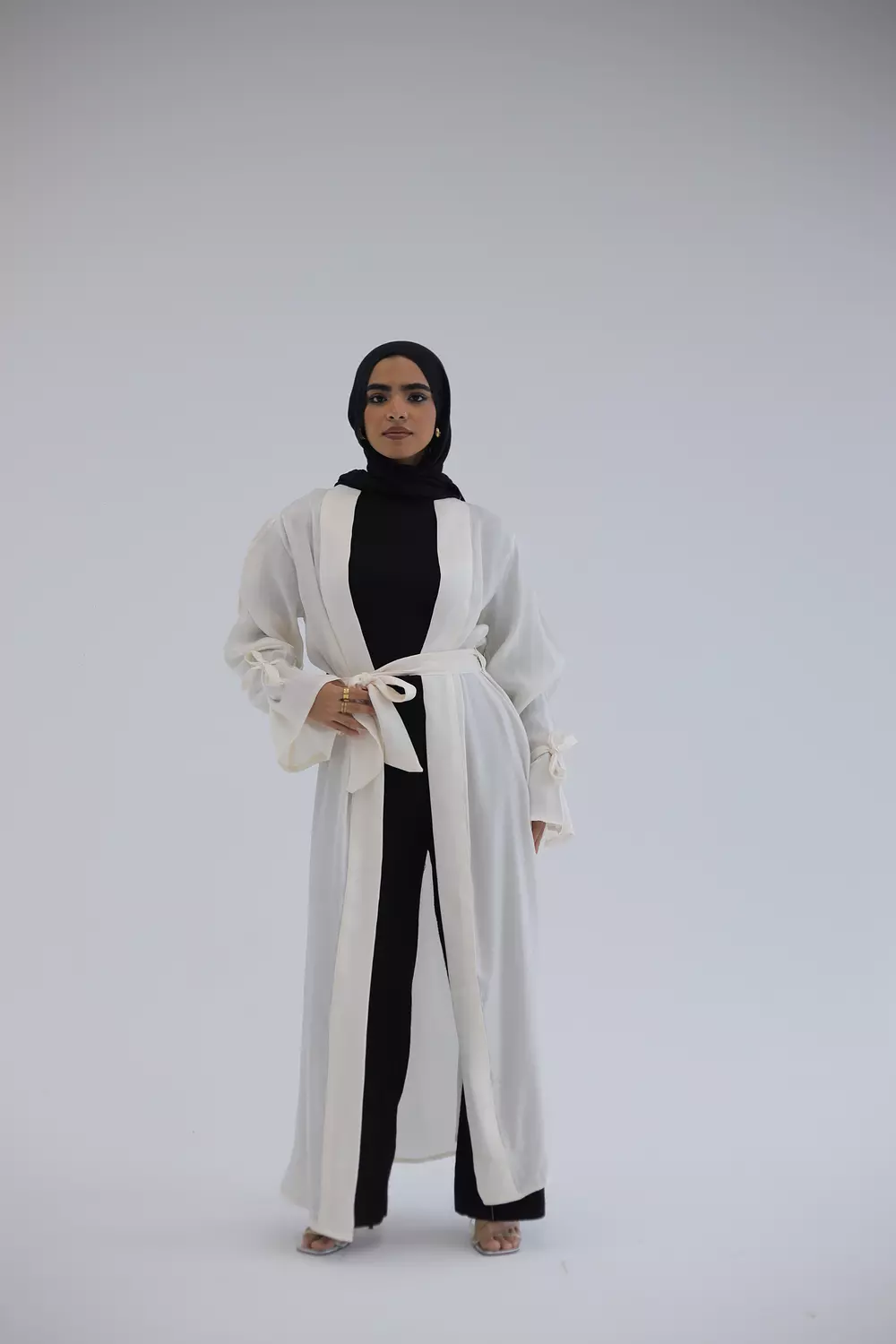 White cardigan stan with a waistband hover image