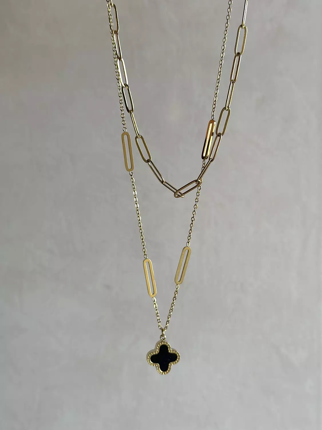 Paper clip van separate necklaces (double sided black x white) image