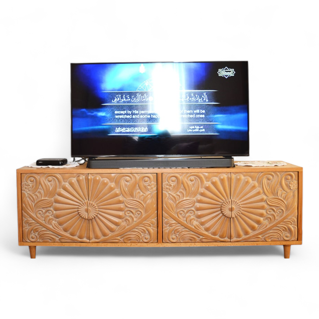carved wooden TV unit image