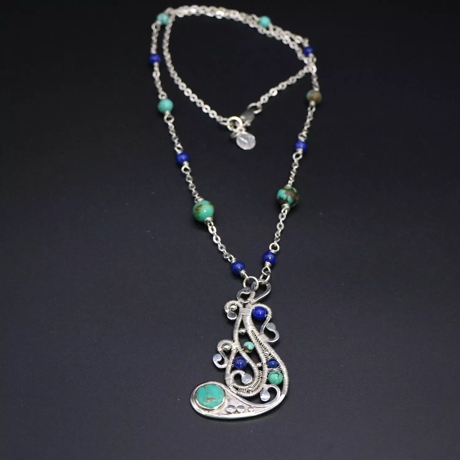 Wire wrapped silver necklace with turquoise and Lapis lazuli gemstones. 1