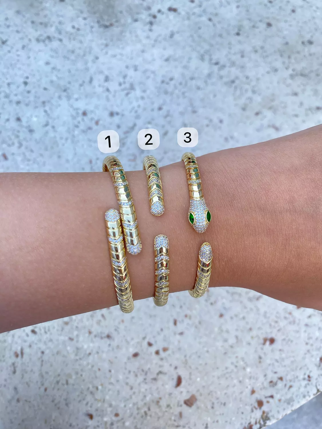 ‘The snake ’ gold platted bangles 1