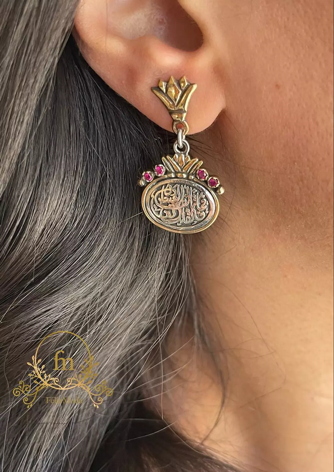 فما تألفه العين فالقلب الفه Silver earrings gold plated with pink stones image