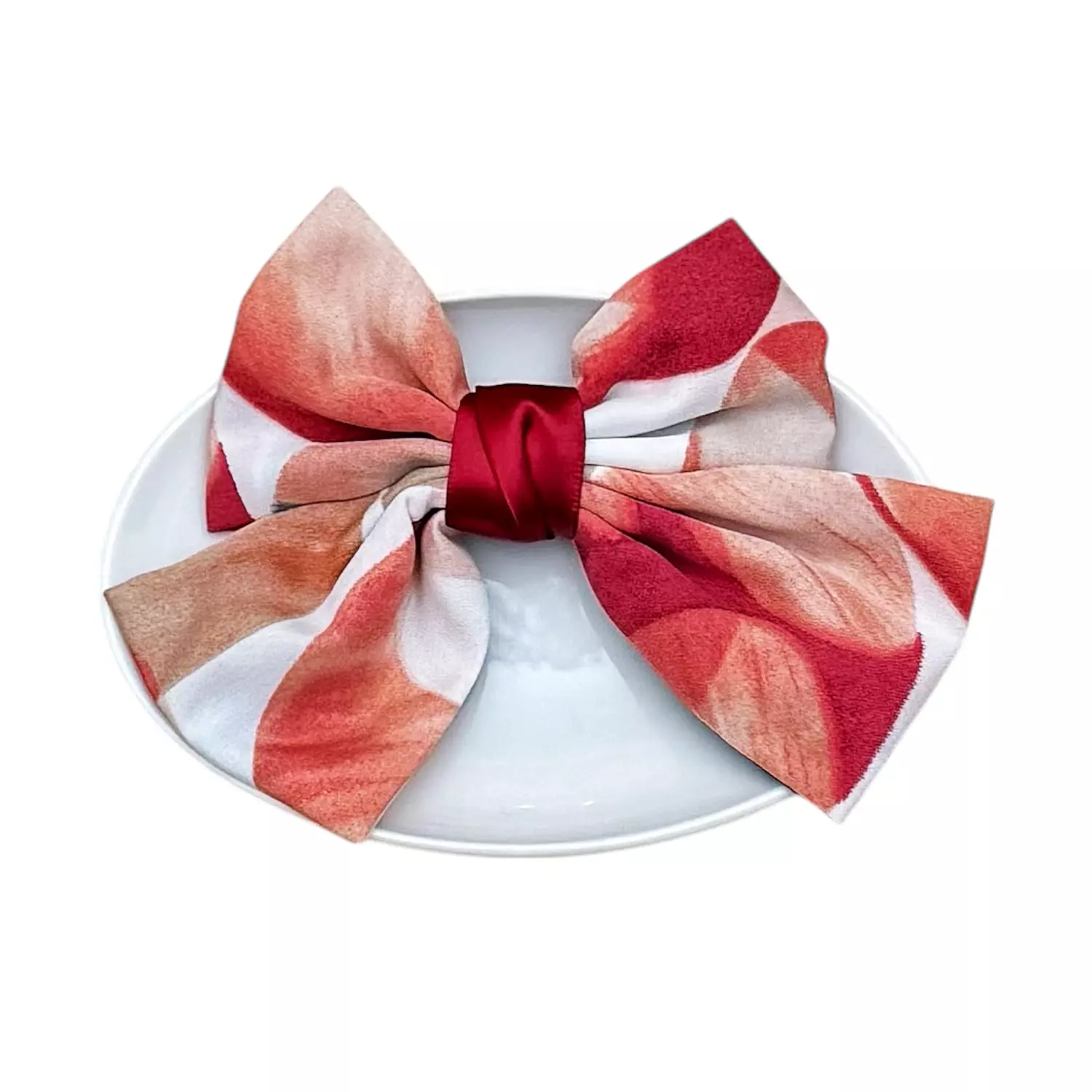 <p style="text-align: center">Orange/Red Tropical Bowtie Hair Clip</p>