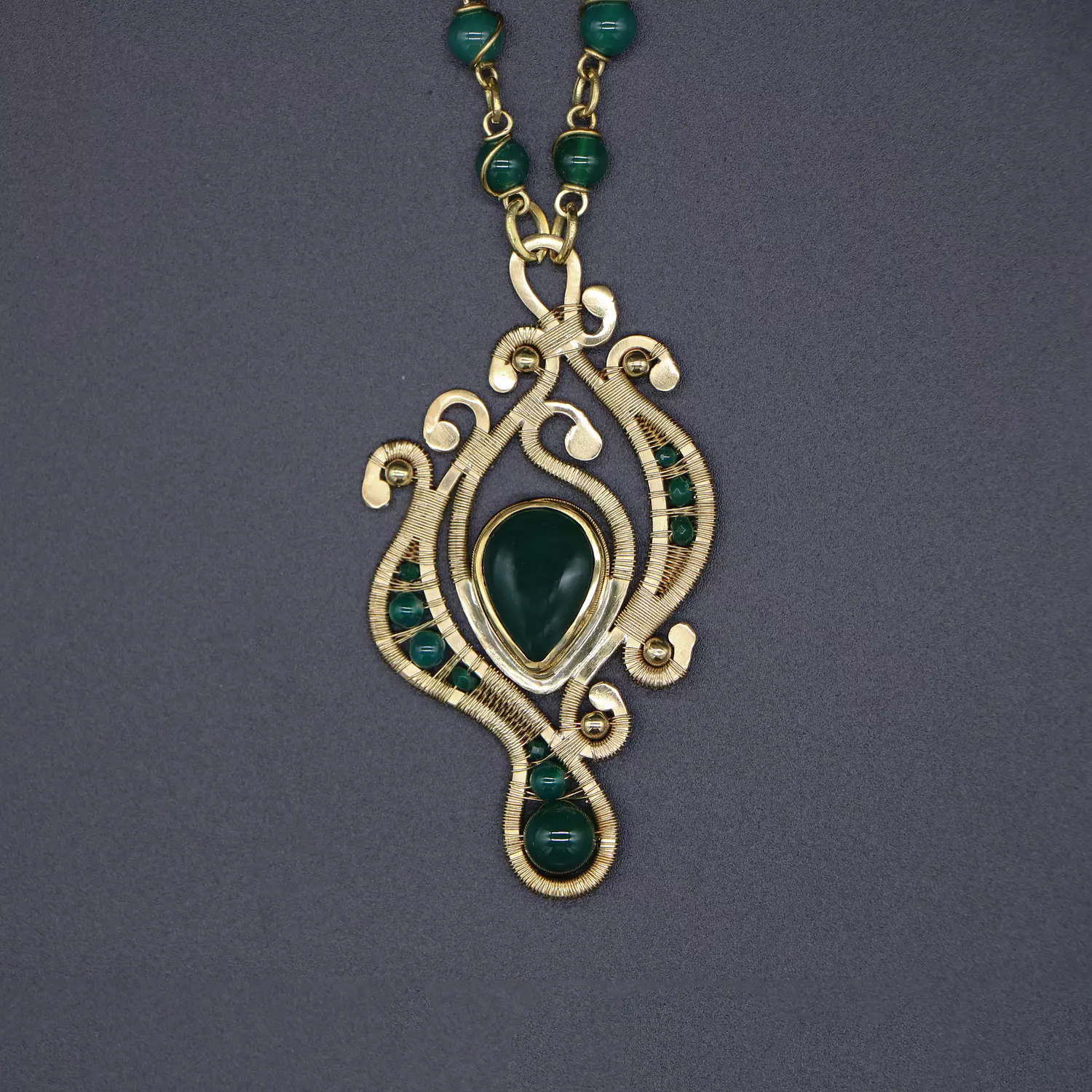 Necklace with green agate gemstones. image