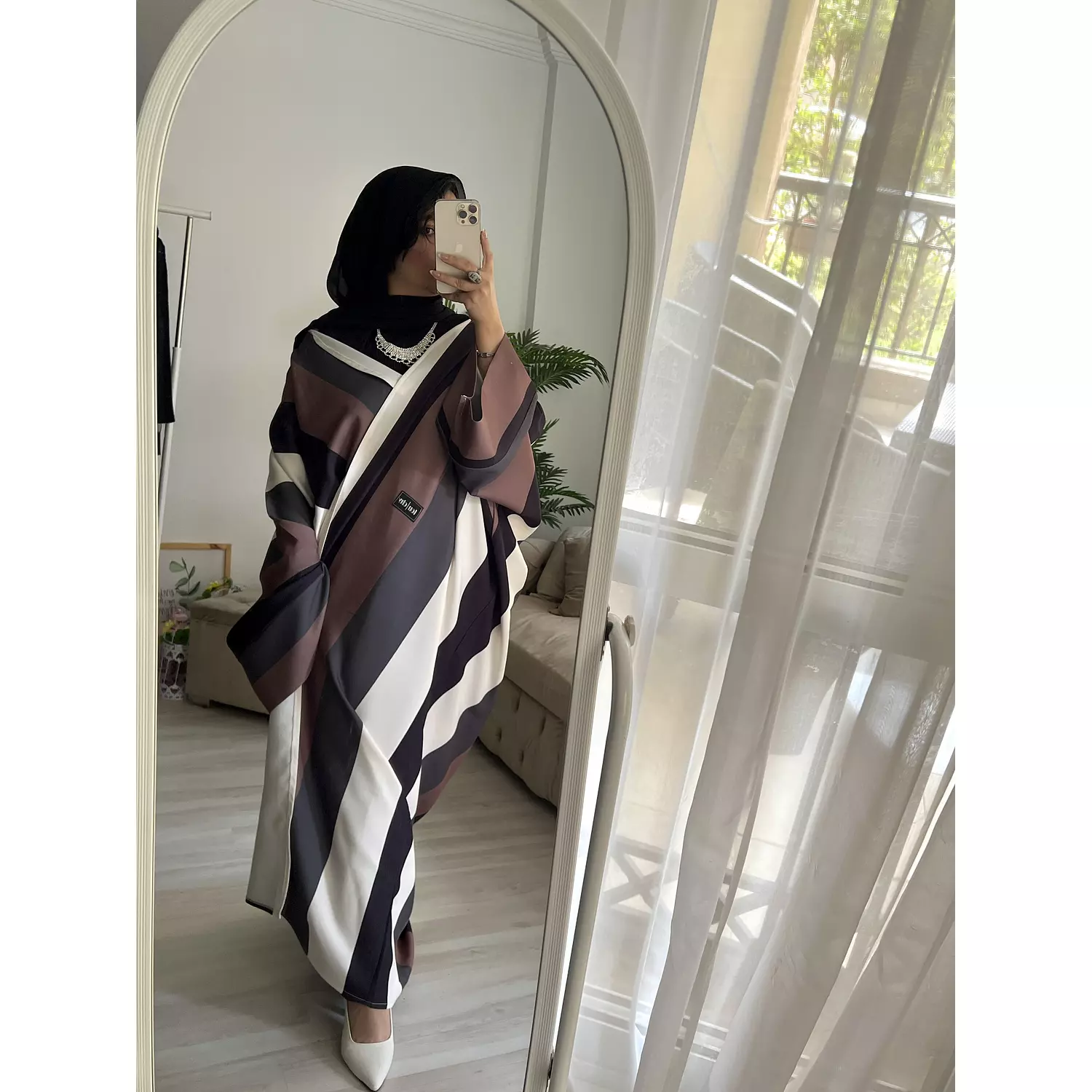 Striped abaya hover image