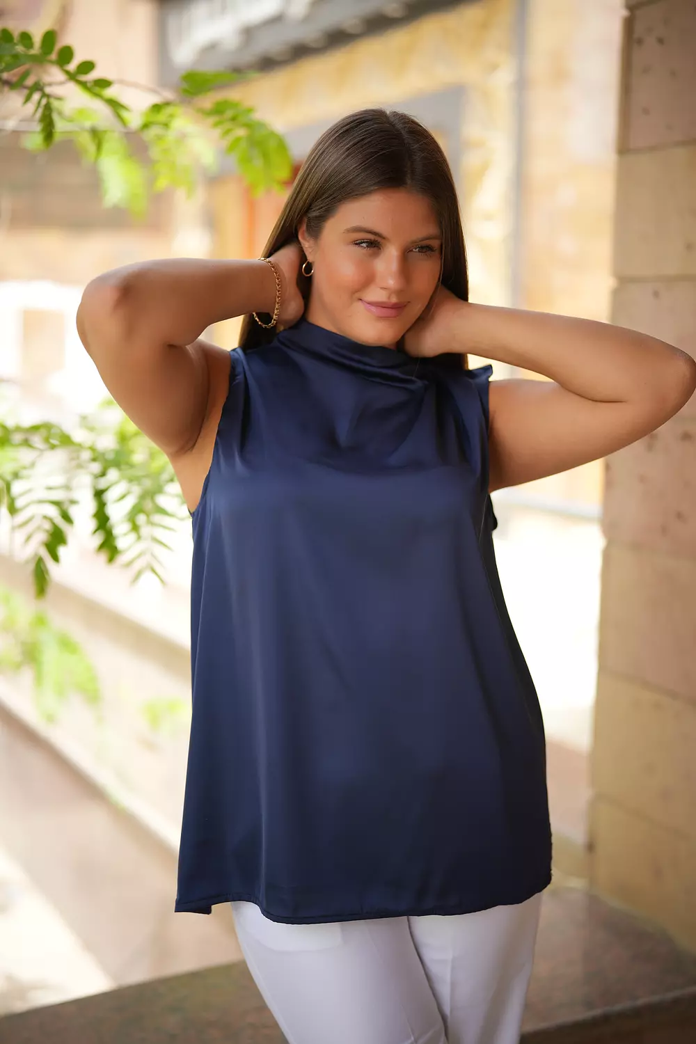 Sleeveless satin blouse 18