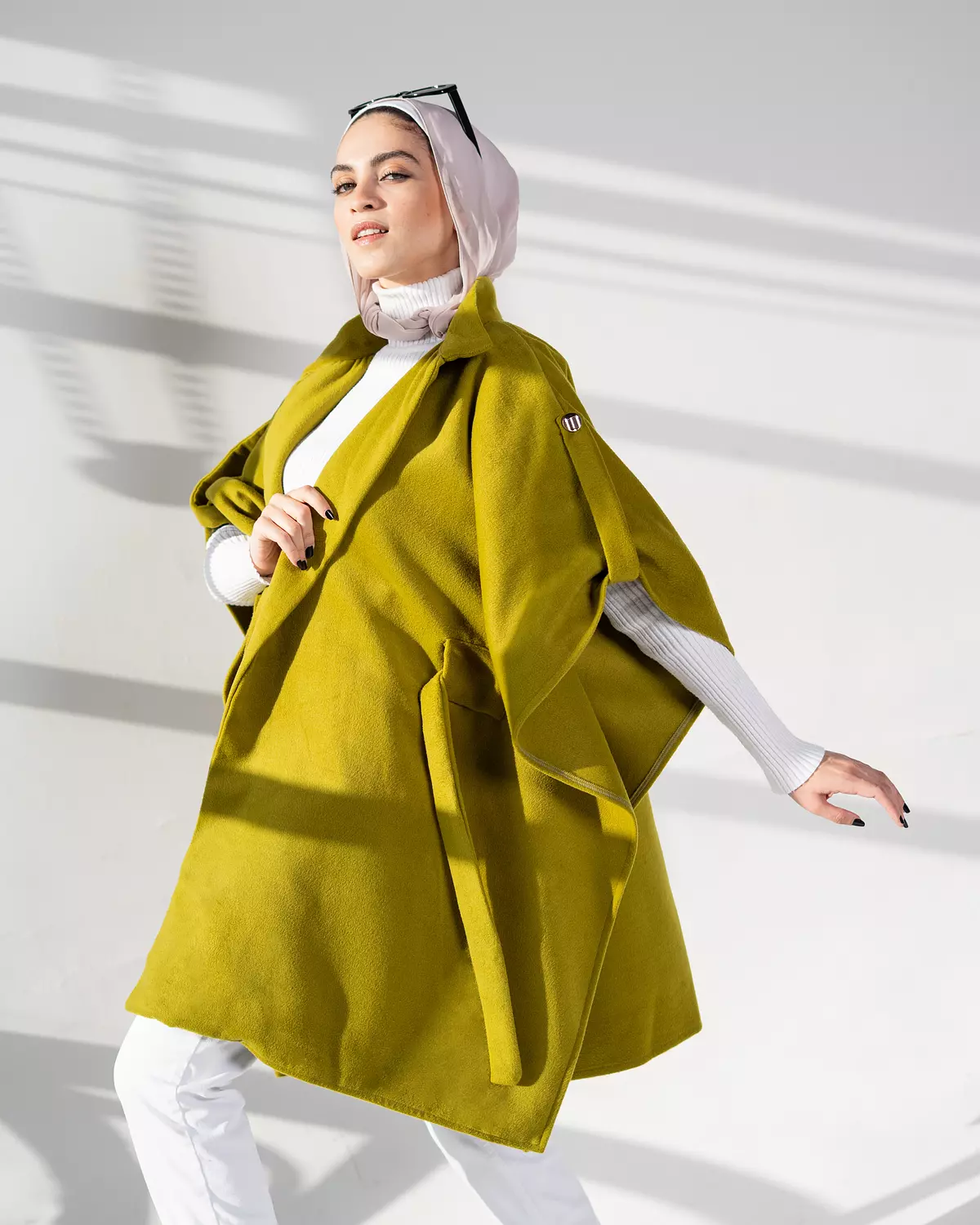 <h4><span style="color: #46585d">KHAKI MOHAIR WOOL STATEMENT CAPE</span></h4>