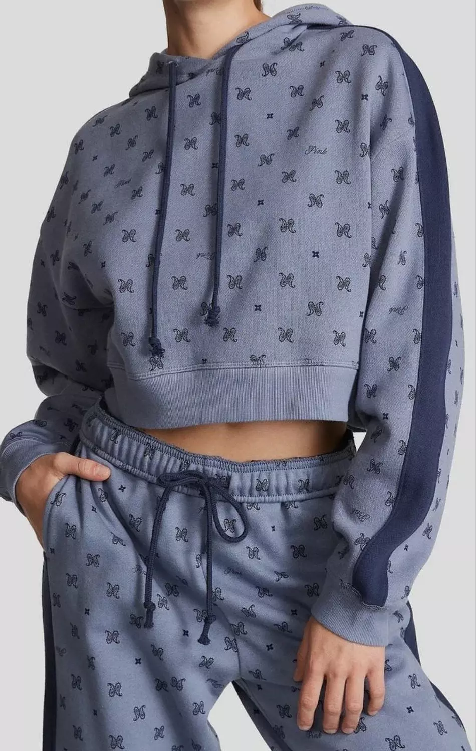 two-piece coordinated set featuring a cropped hoodie and matching joggers. image