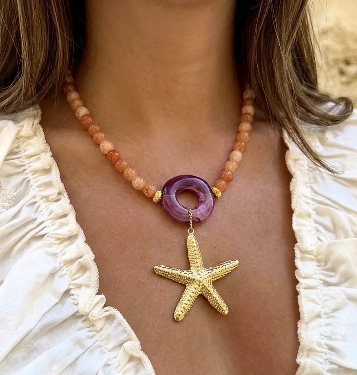 Peachy Dropping Starfish image