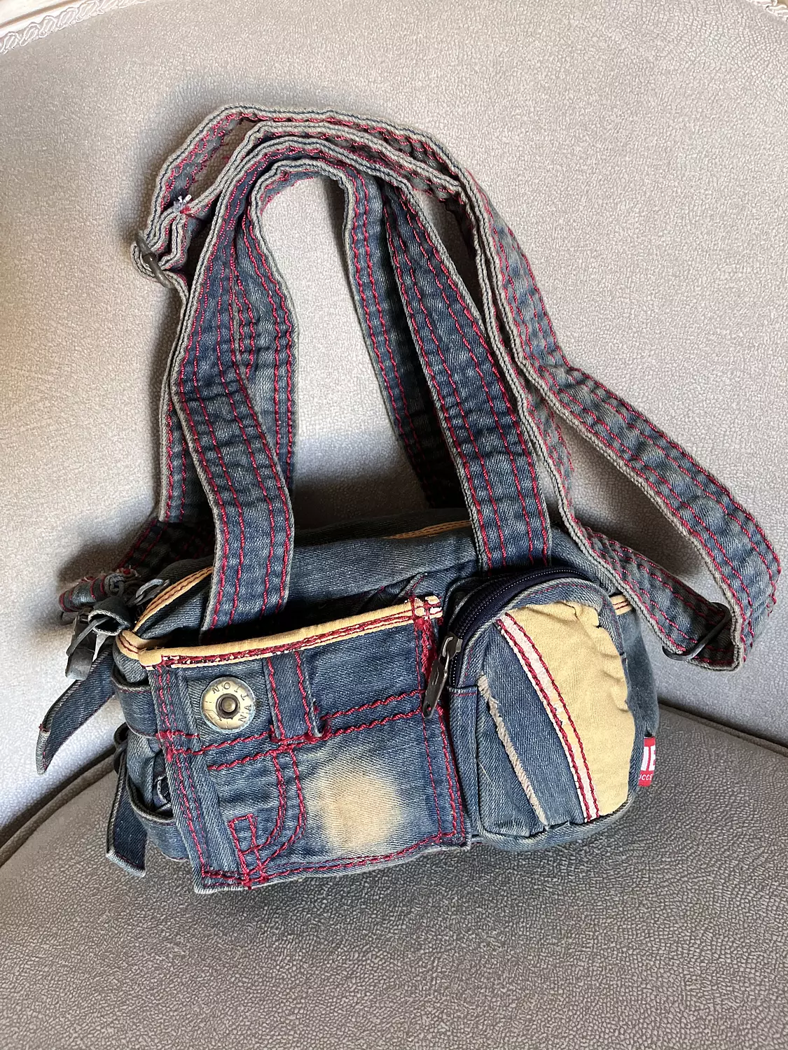 Denim diesel bag with pink stitching image