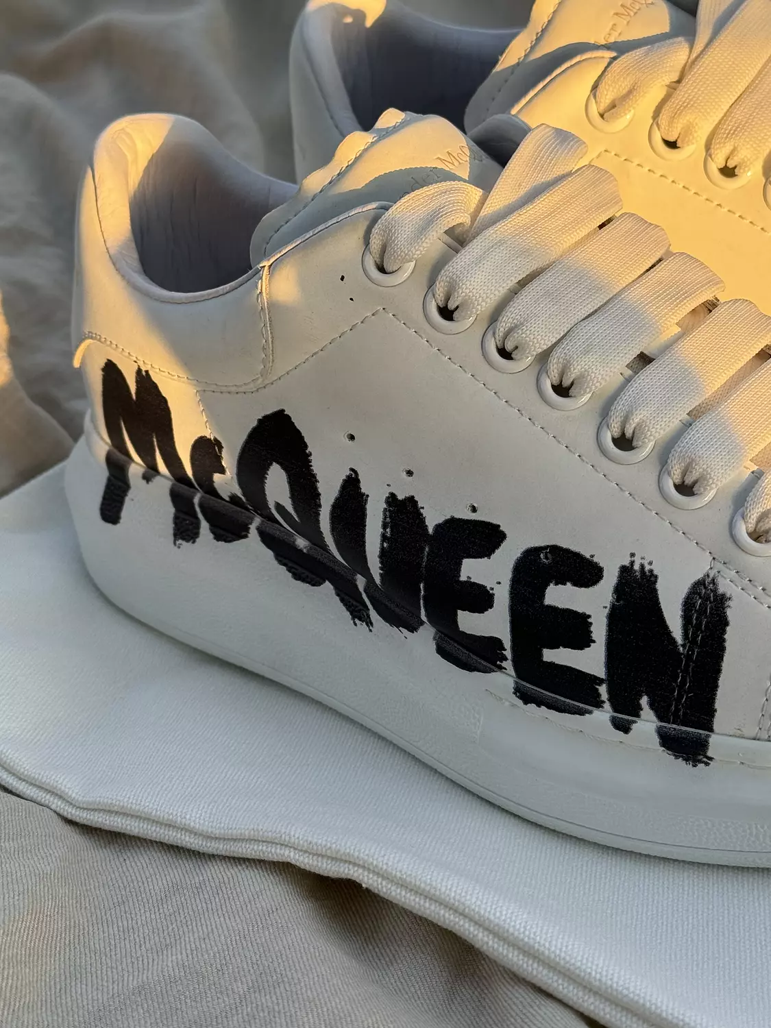 Alexander McQueen graffiti-logo print leather White 1