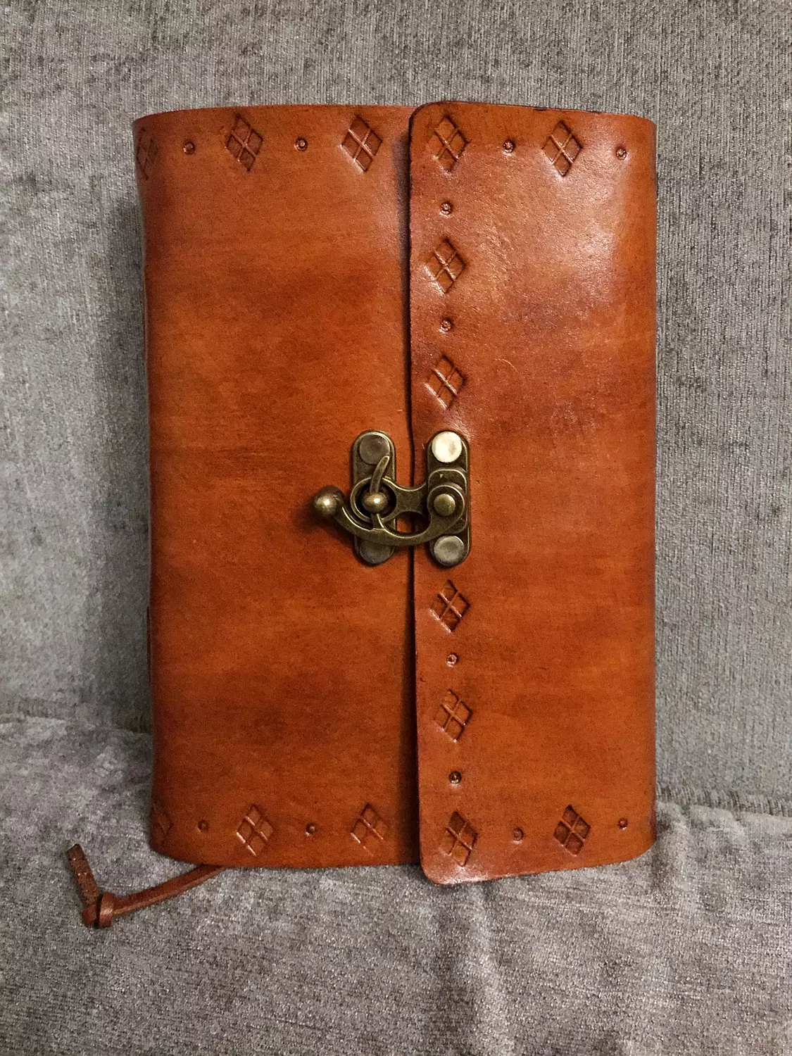 Tooled diamond border leather journal with lock clasp  image