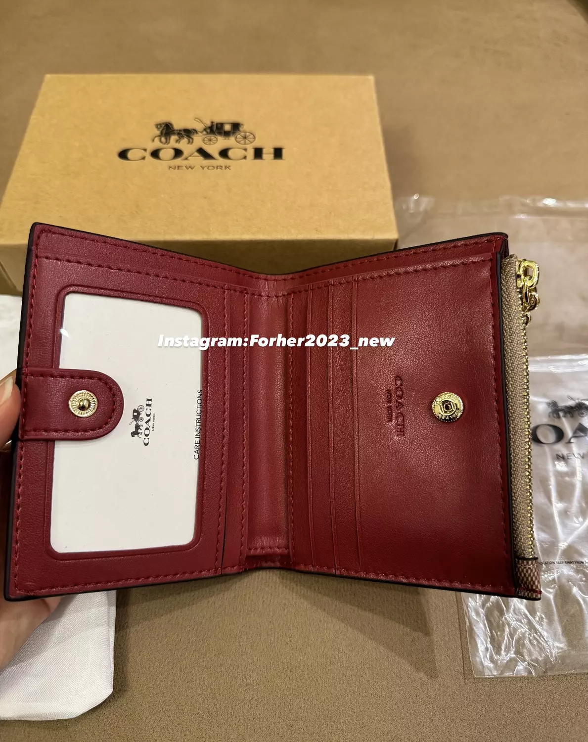 Coach bifold wallet light brown with pinkish flowers  1