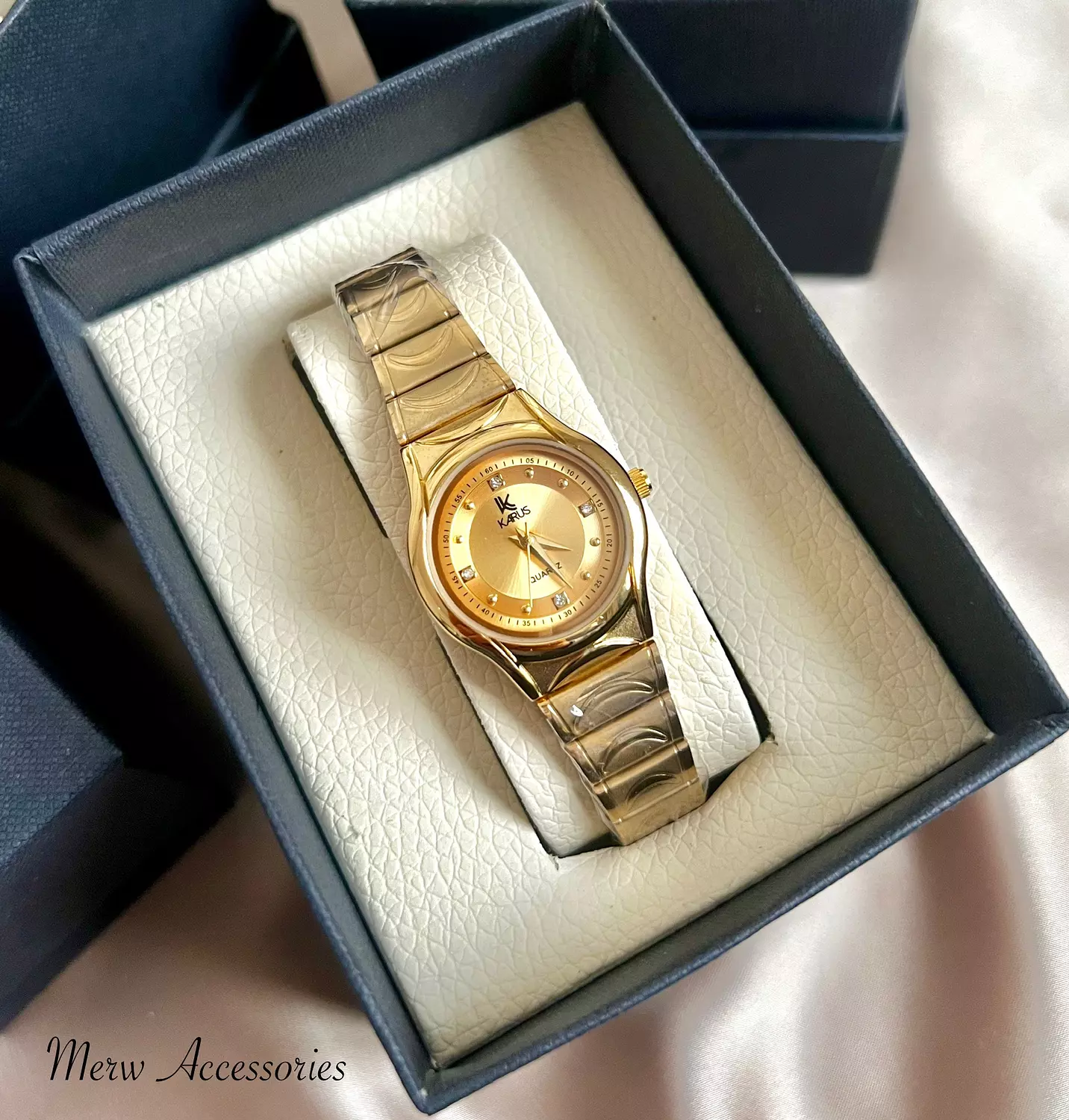 Gold karus women watch  image