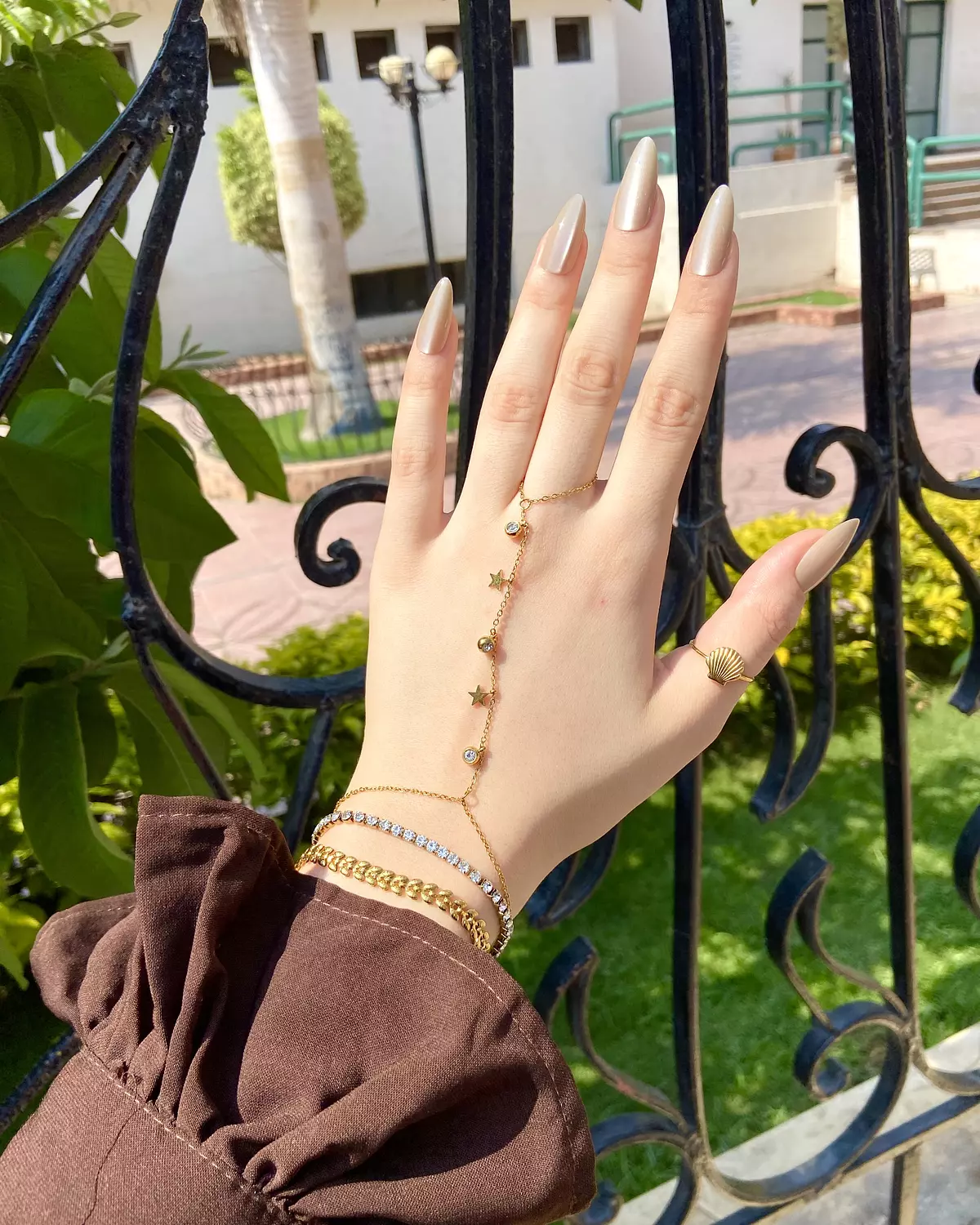 Stainless steel hand chain with stars and crystals image