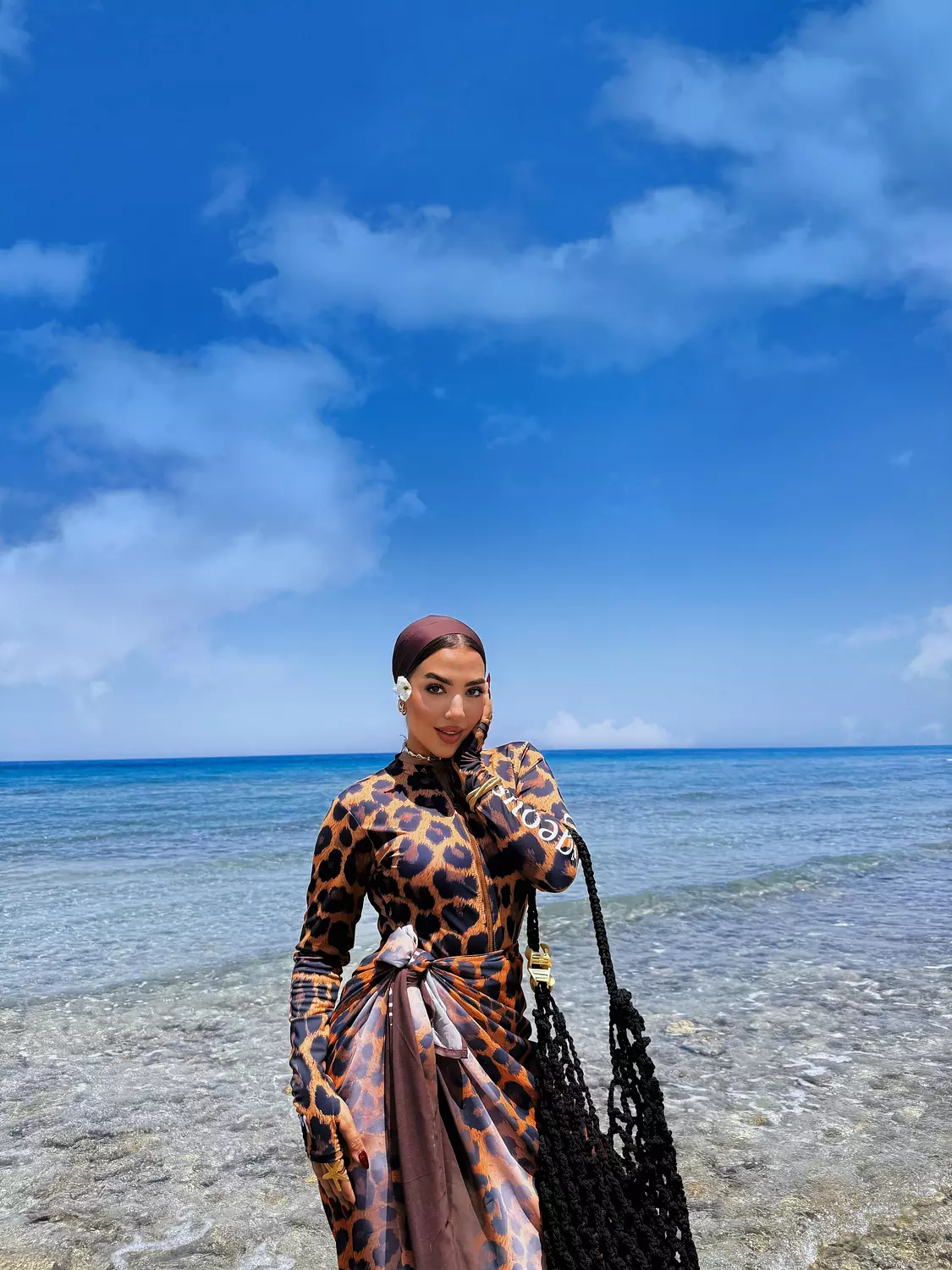 Leopard Lagoon swim top hover image