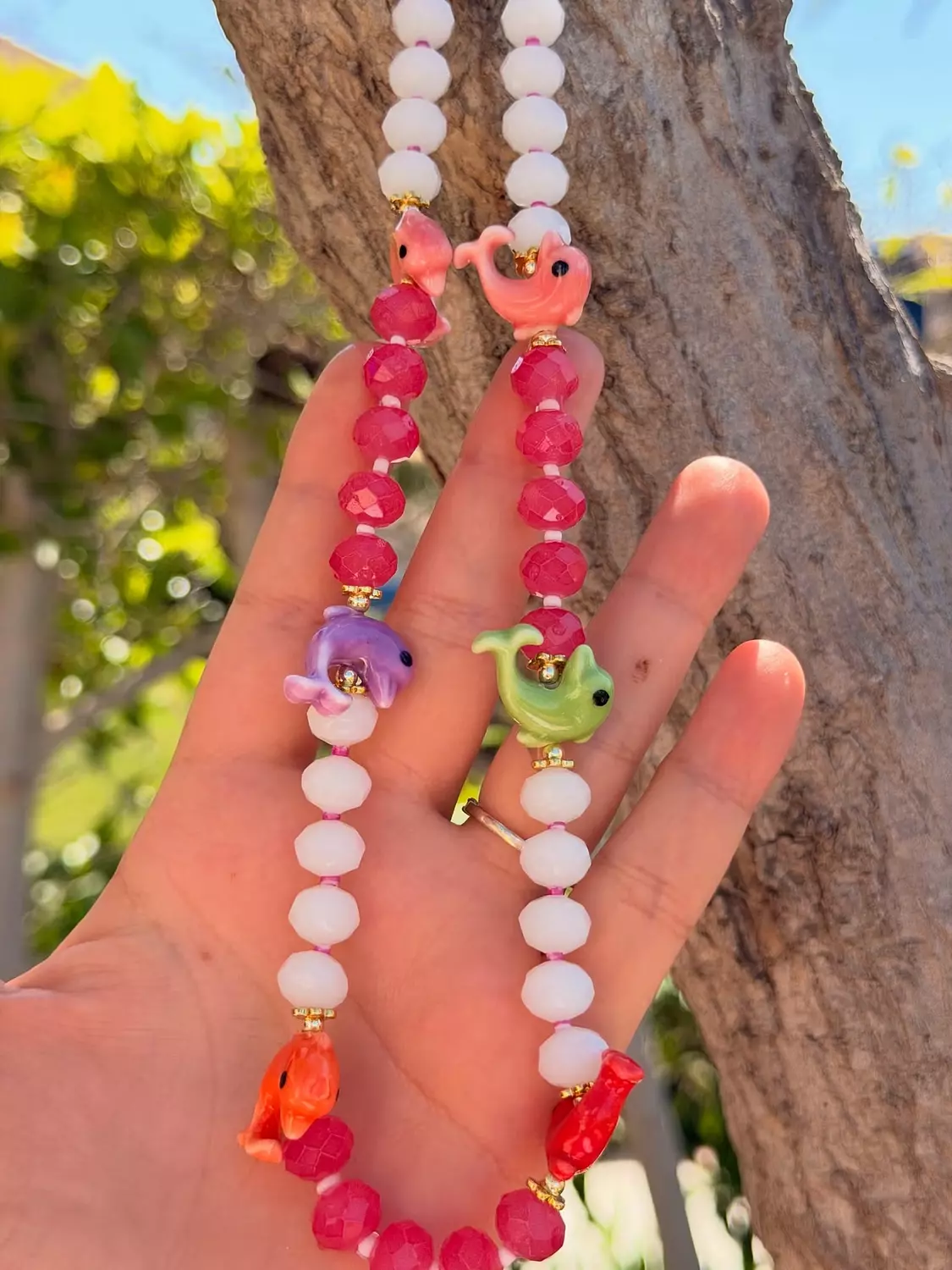 Dolphins Charms Necklace hover image