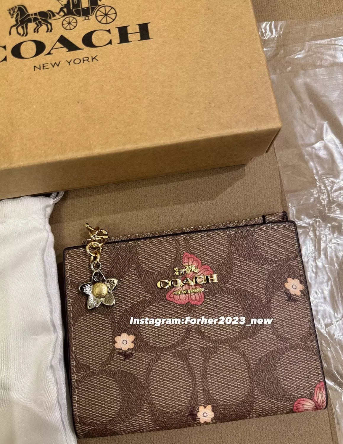 Coach bifold wallet with flowers image