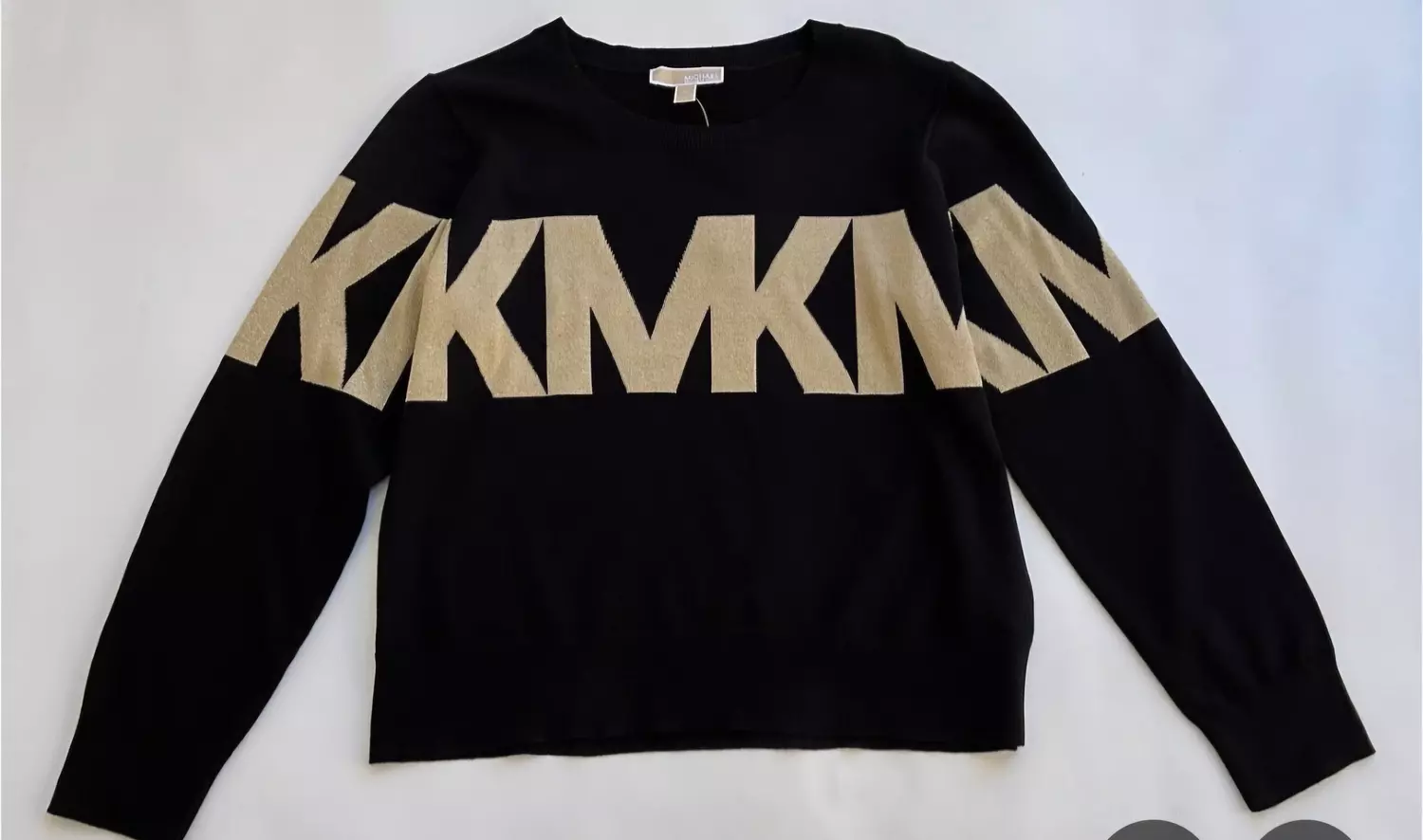 Michael kors black knit and the prominent gleaming  hover image
