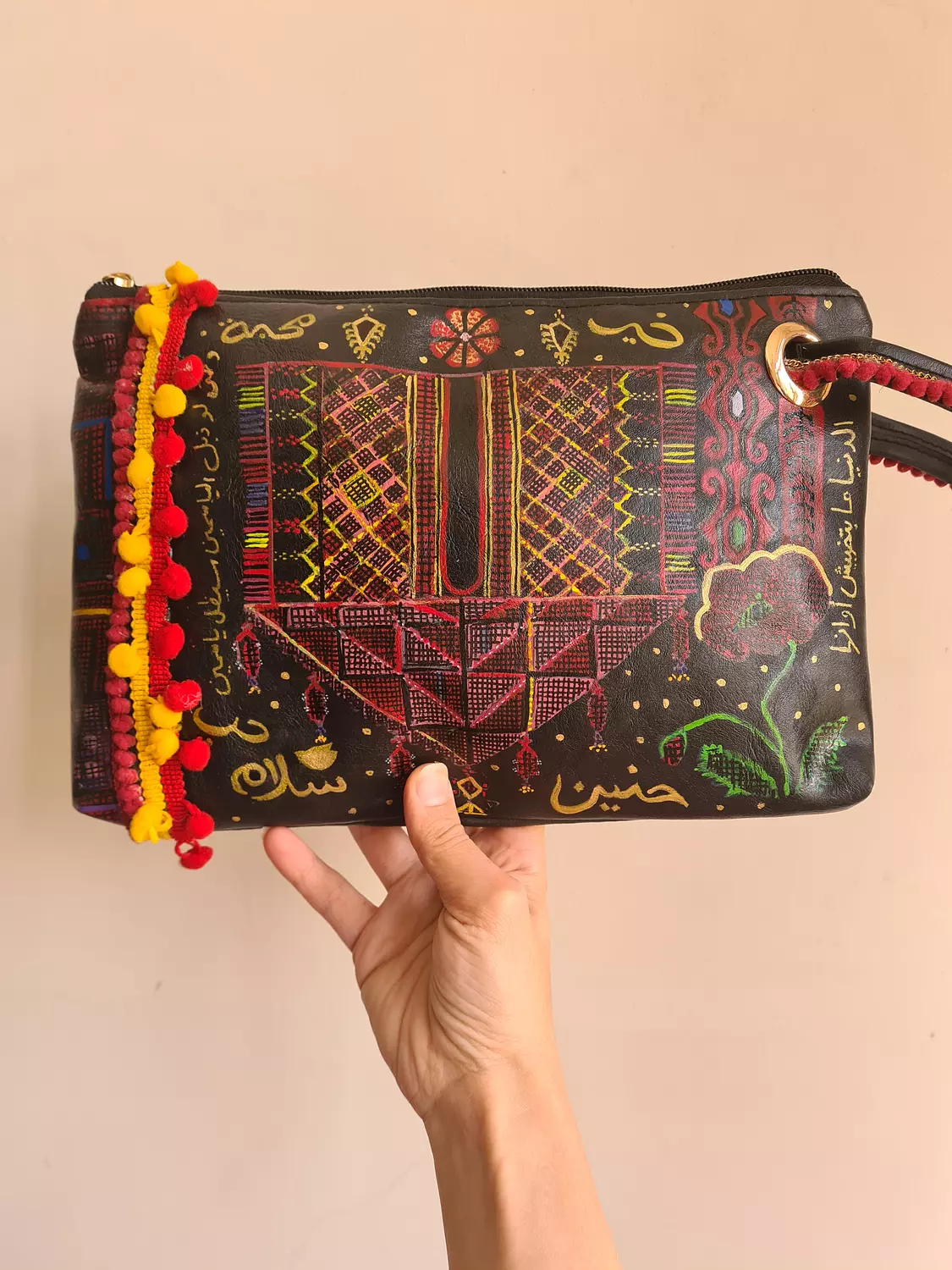 Tatreez pattern leather clutch  image