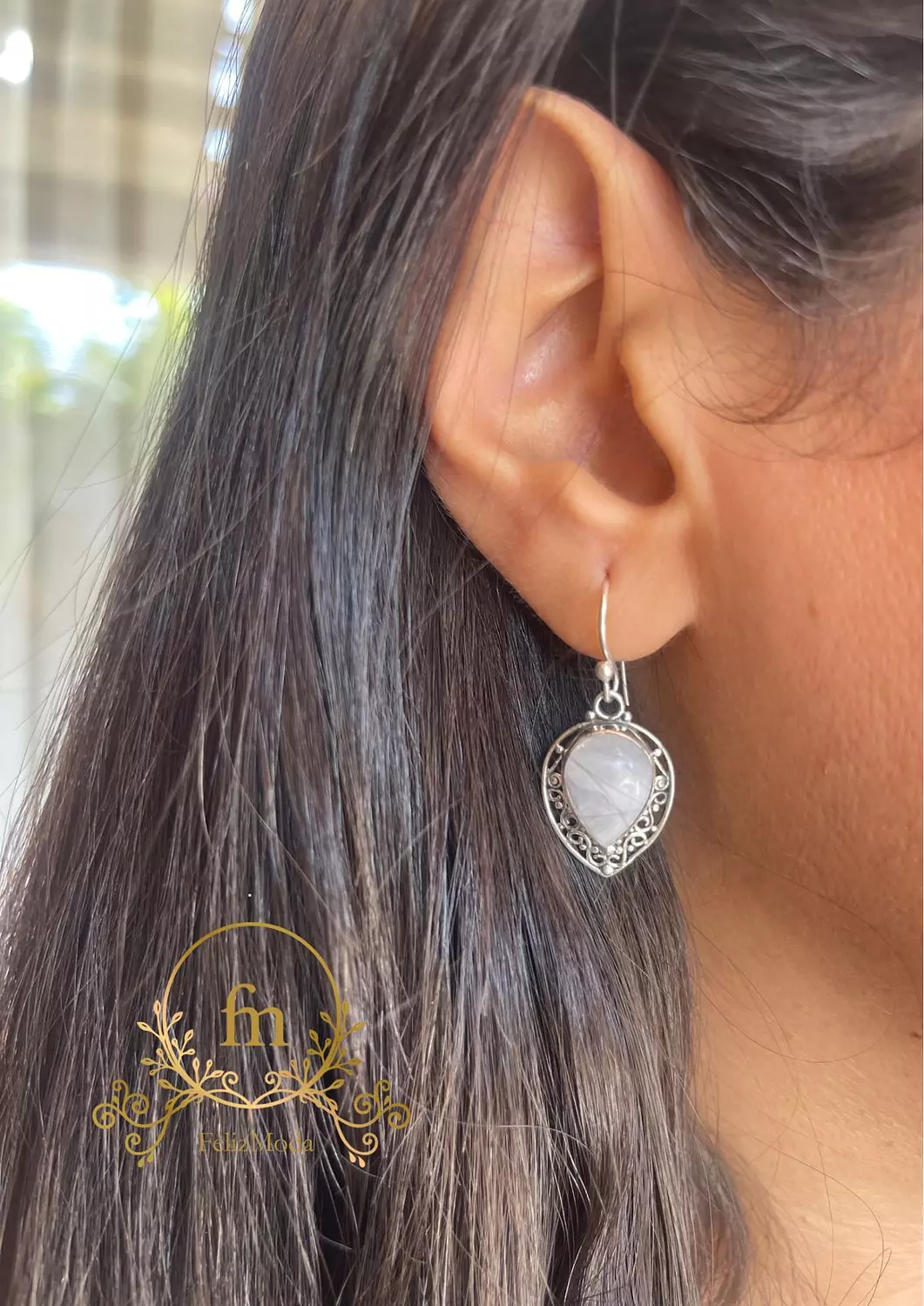 Gray stone silver earrings with frame image