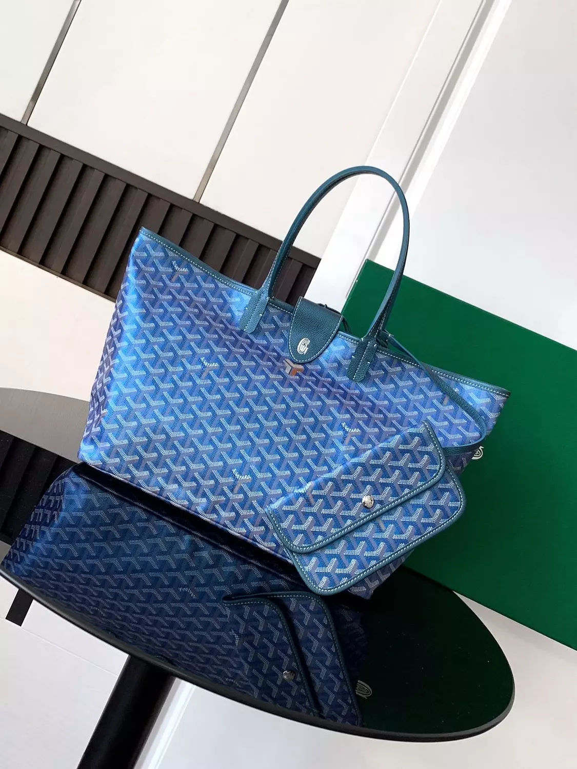 Go yard This limited-edition handbag is crafted from unique pearlescent GOYARDINE canvas,Pearl blue hover image