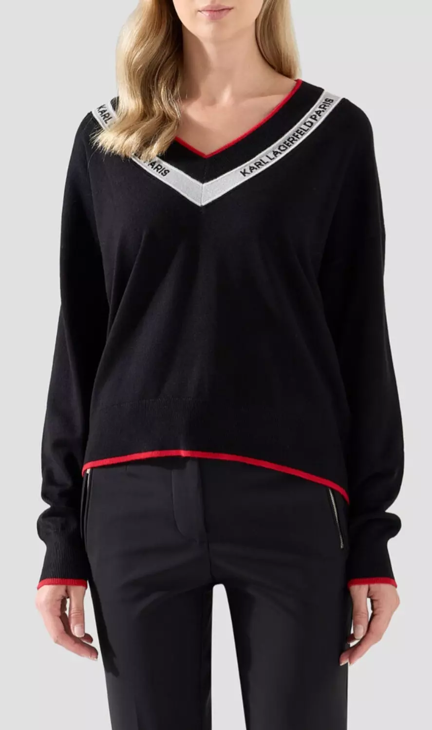 KARL Lagerfeld Paris knit sweater that offers a sophisticated and sporty aesthetic image